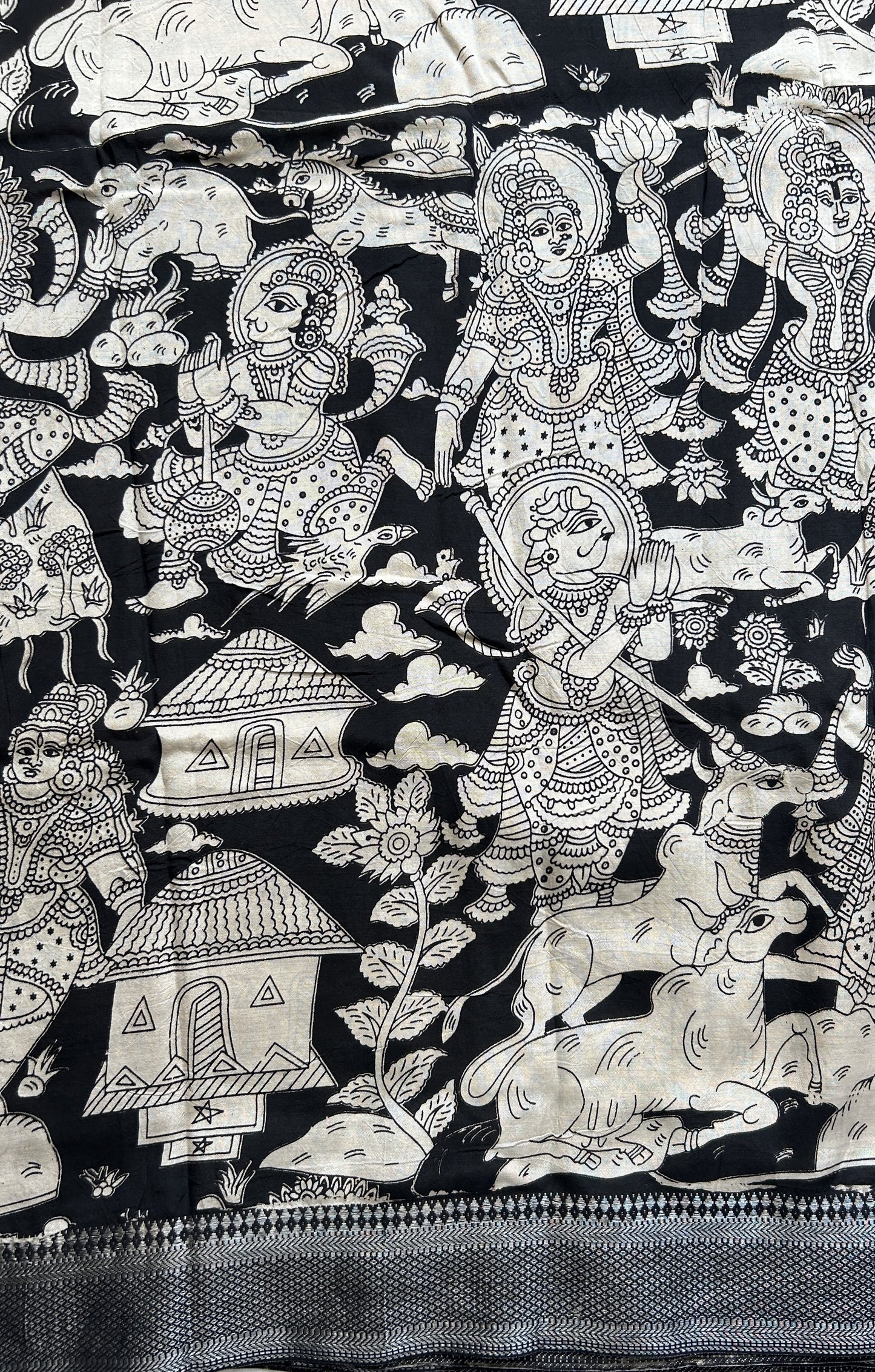 Mangalagiri Pen Kalamkari Saree Beige colored complemented with a Black Colored Zari border - Sampradaya Designer Studio