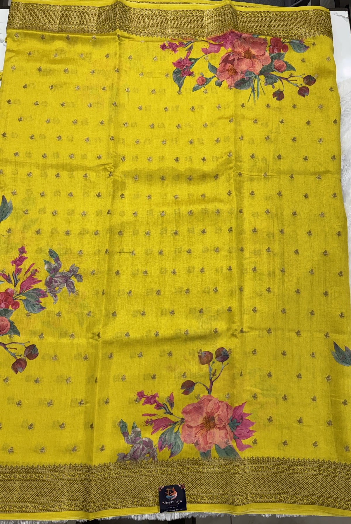 Pure Chiniya Silk Saree Yellow Colored Elegantly Paired with a Gold Zari Border.