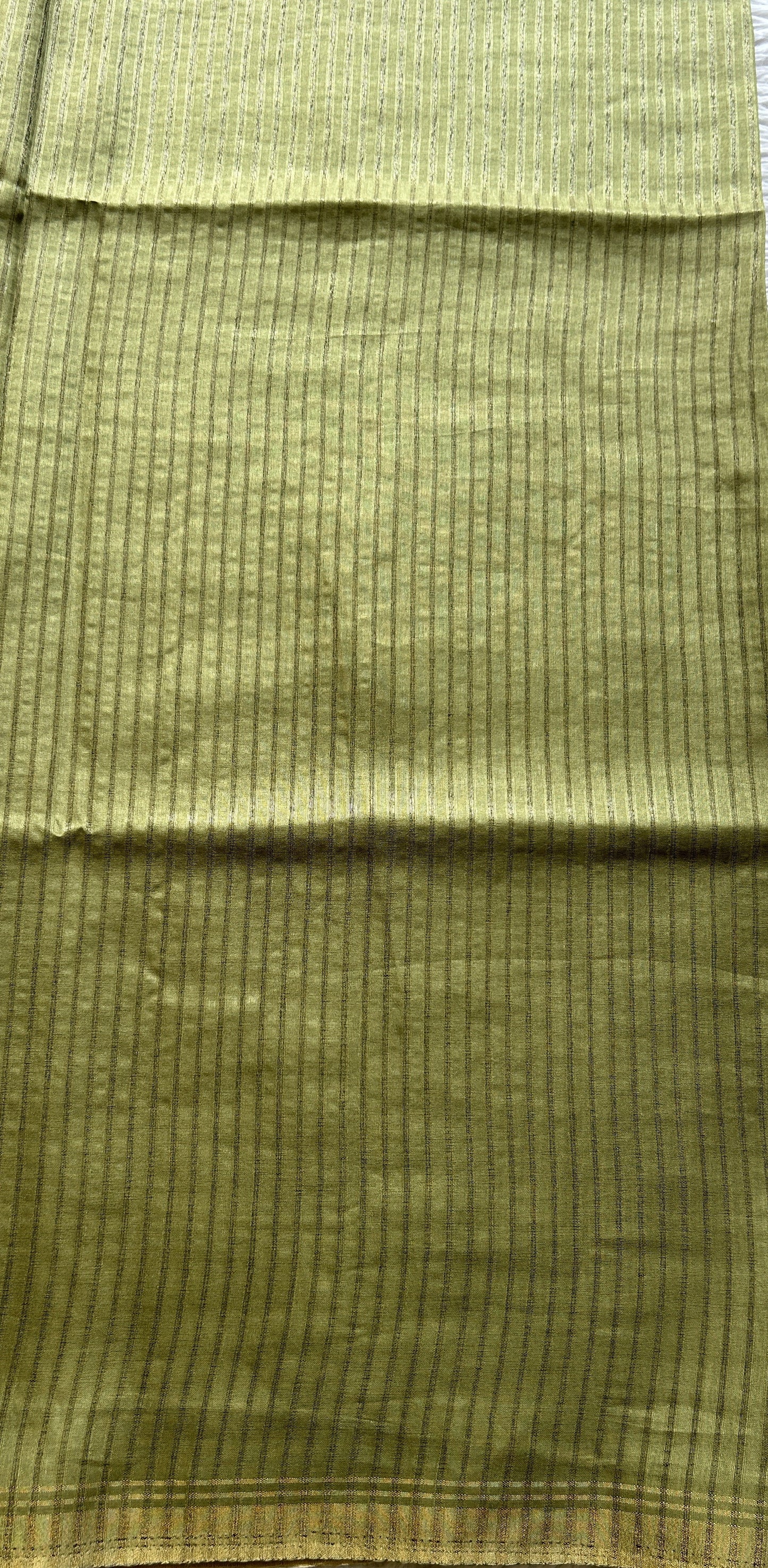 Semi Tussar Saree Avocado Colored complemented with a Zari Border. - Sampradaya Designer Studio