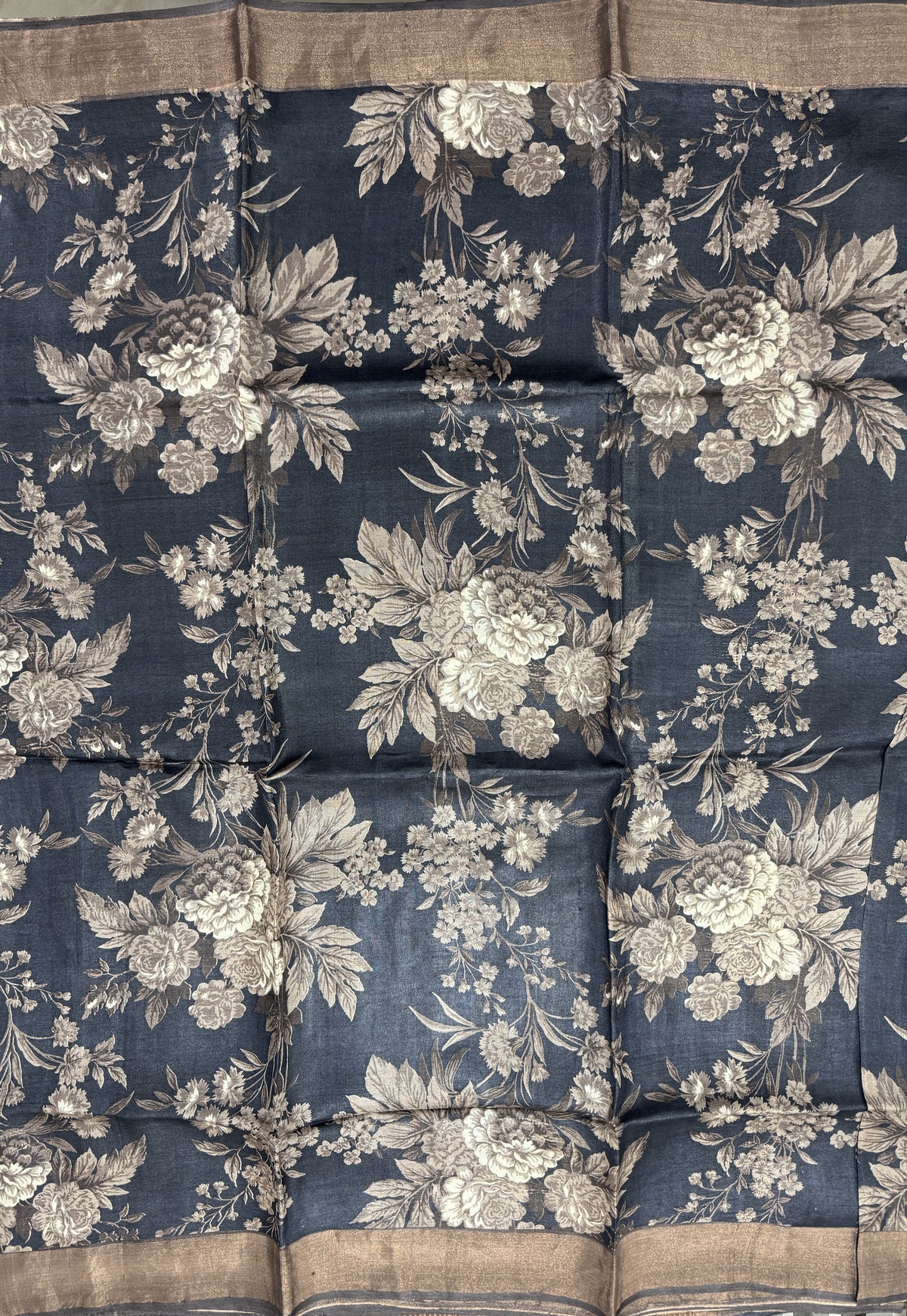 Pure Tussar Silk Saree Black Color Complemented with a Zari Border.