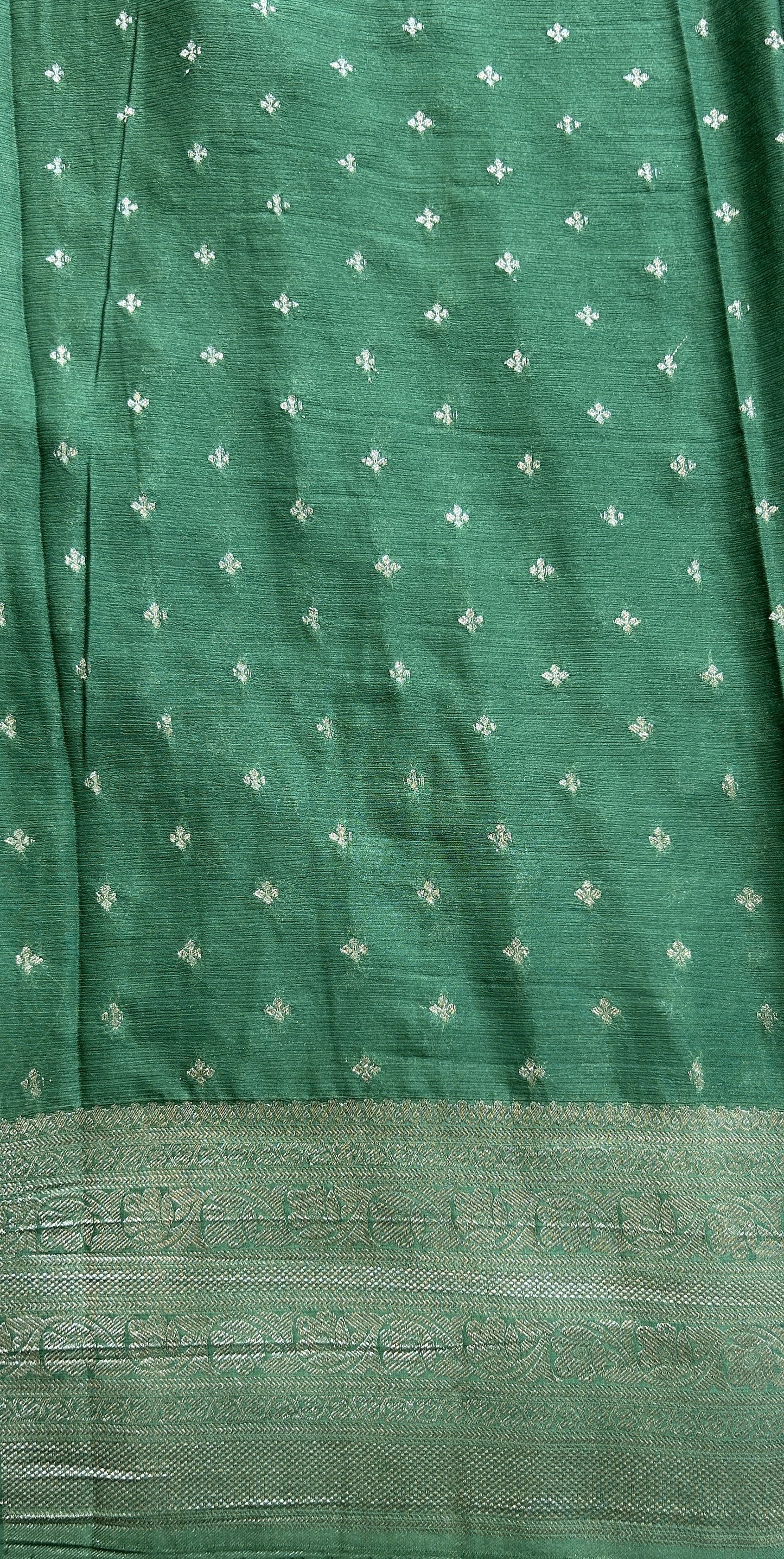 Semi Georgette Saree Green Colored Complemented with a Zari Border. - Sampradaya Designer Studio
