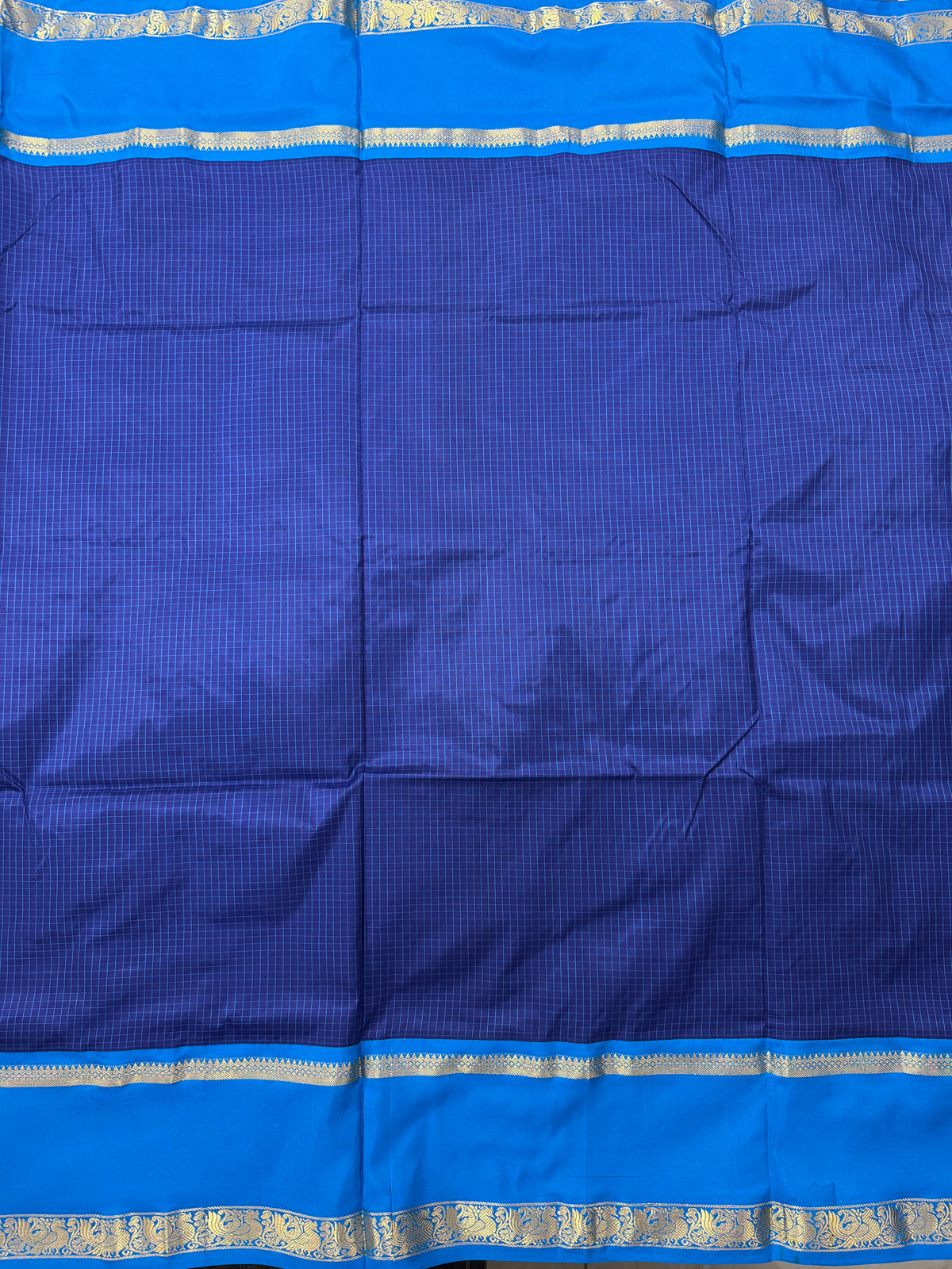Narayanpet Silk Saree Navy Blue Colored Complemented with a Blue Zari Border.