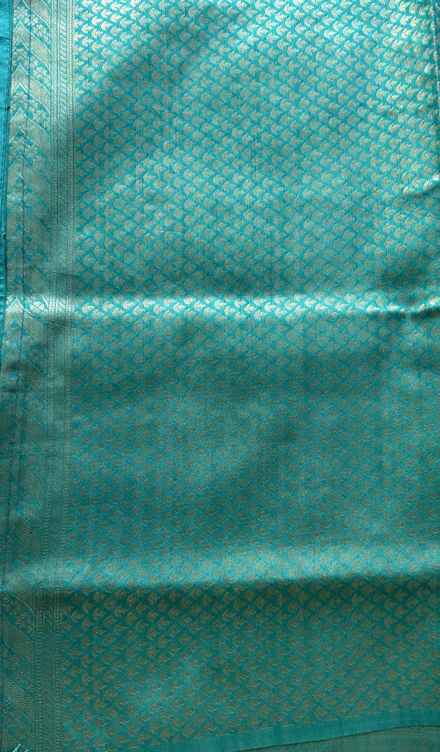 Semi Raw Silk Allover Saree Aqua Blue Colored Elegantly Paired with a Zari Border. - Sampradaya Designer Studio