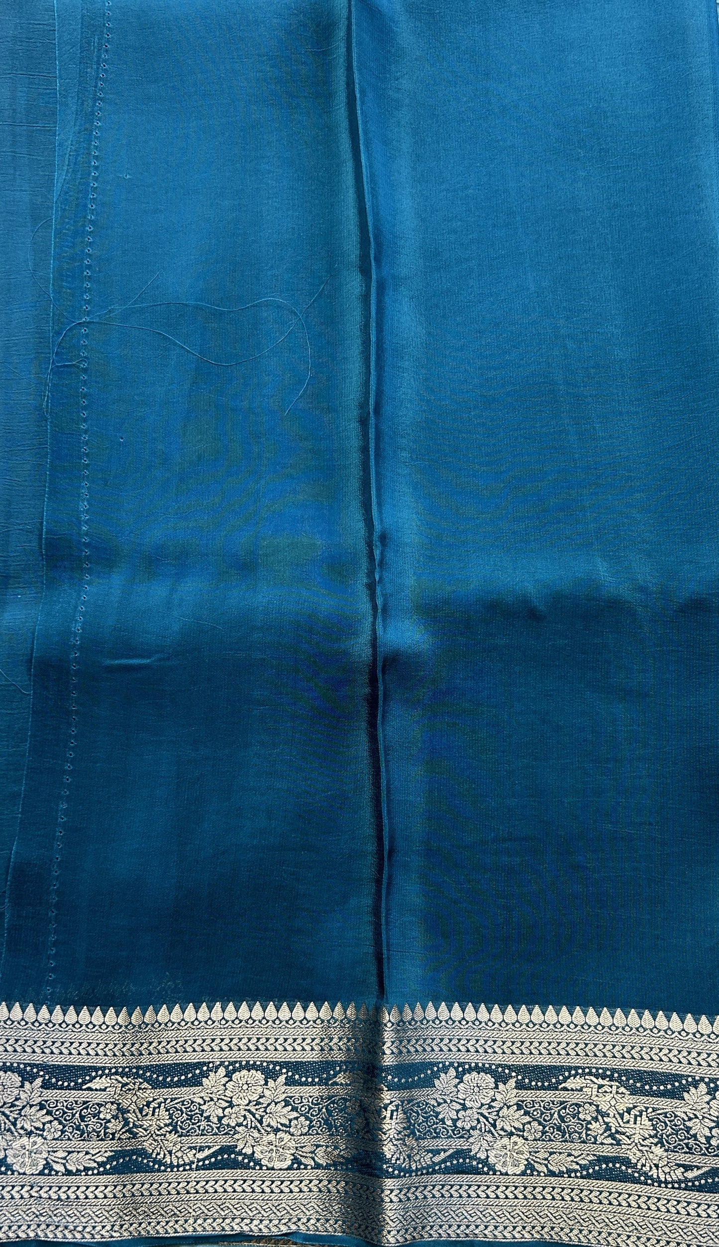 Satin Georgette Saree Peacock Blue Colored Elegantly Paired with a Zari Border. - Sampradaya Designer Studio