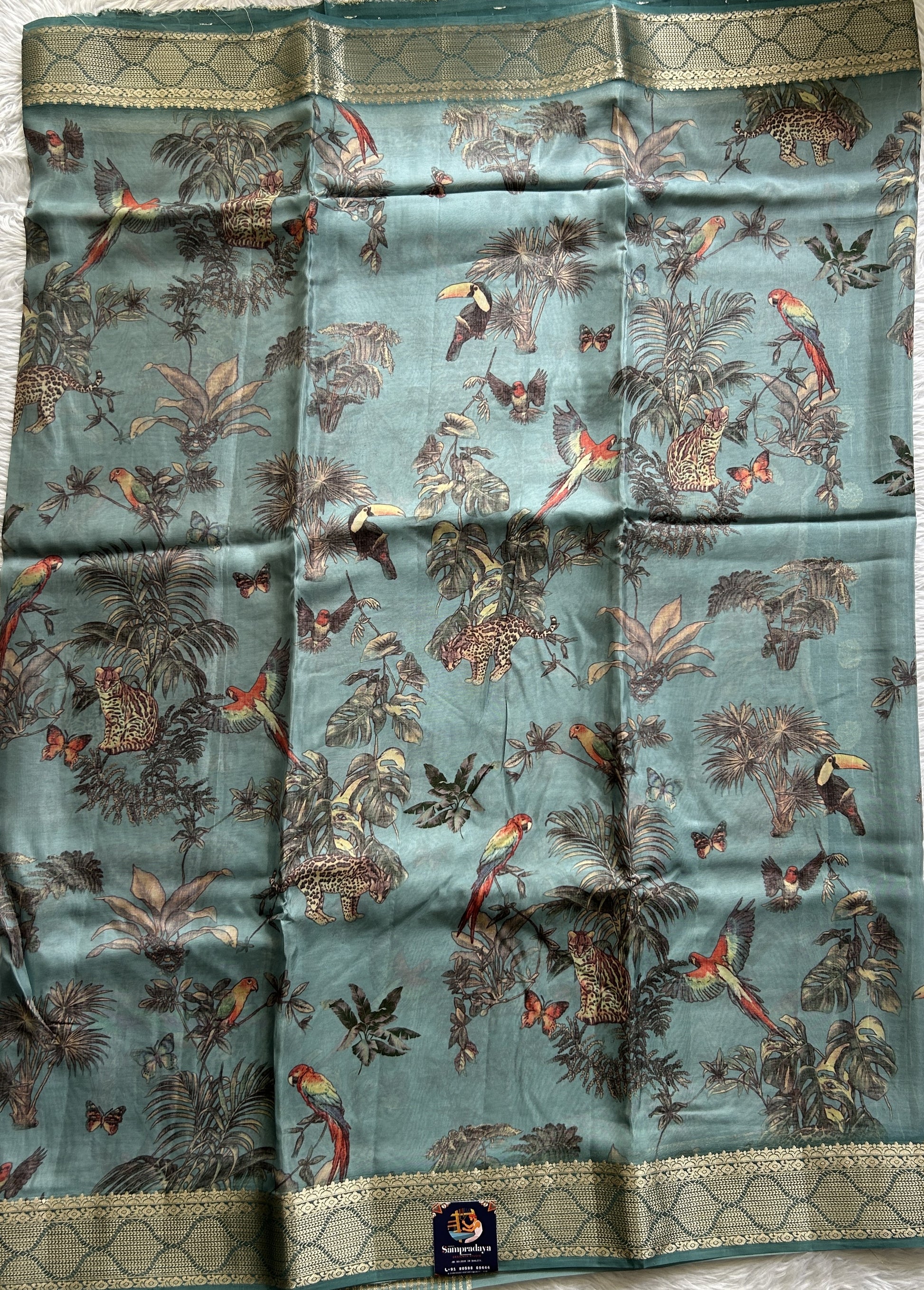 Banarasi Soft Silk Saree Sea Blue Colored Complemented with a Zari Border. - Sampradaya Designer Studio