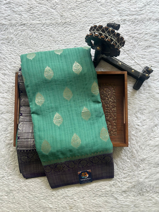 Semi Georgette Saree Sea Green Colored Elegantly Paired with a Zari Border. - Sampradaya Designer Studio