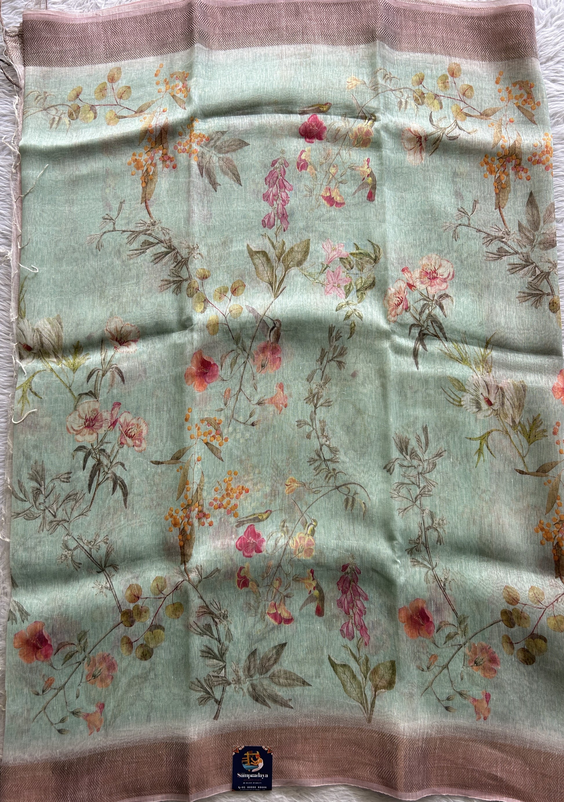 Pure Linen Saree Light Sea Blue Colored Complemented with a Zari Border. - Sampradaya Designer Studio