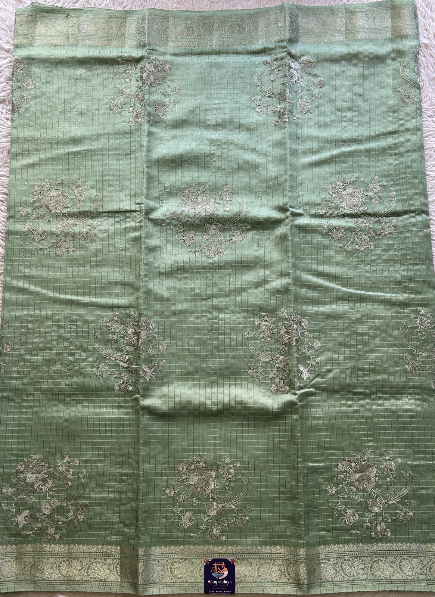 Chiniya Silk Saree Light Green Colored Elegantly Paired with a Zari Border. - Sampradaya Designer Studio