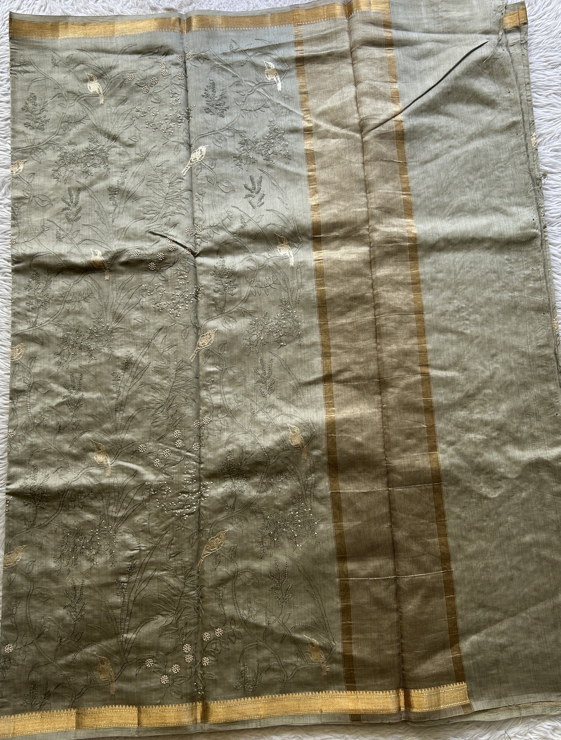 Chiniya Silk Saree Ash Colored Elegantly Paired with a Zari Border. - Sampradaya Designer Studio