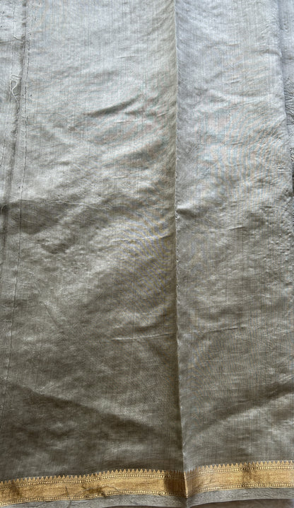 Chiniya Silk Saree Ash Colored Elegantly Paired with a Zari Border. - Sampradaya Designer Studio