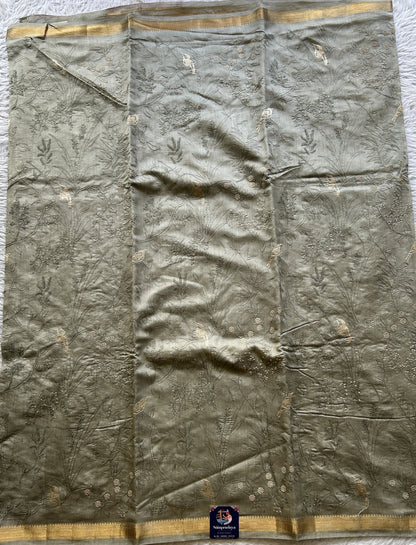 Chiniya Silk Saree Ash Colored Elegantly Paired with a Zari Border. - Sampradaya Designer Studio