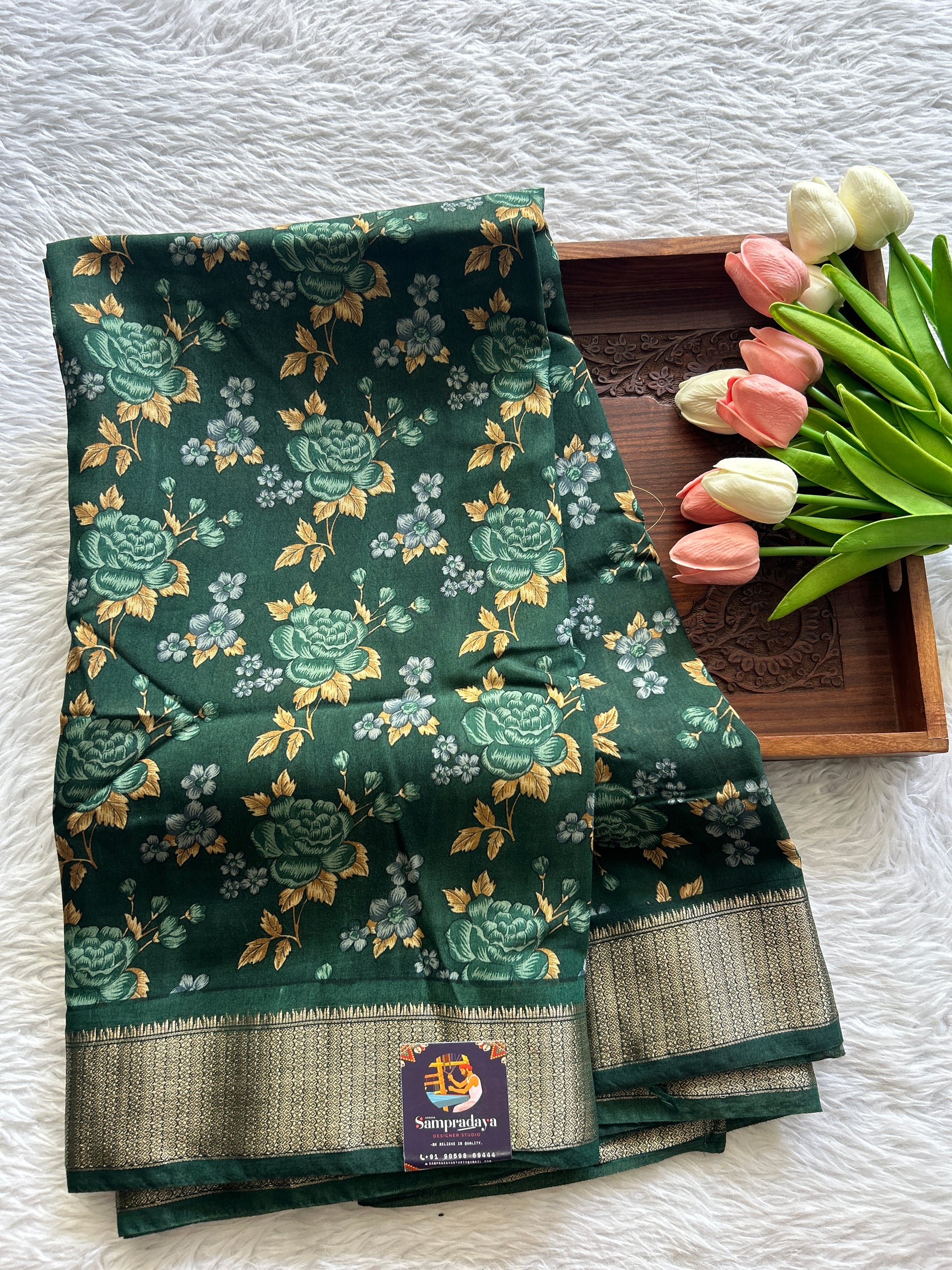 Dola Crepe Saree Dark Green Colored Complemented with a Zari Border. - Sampradaya Designer Studio