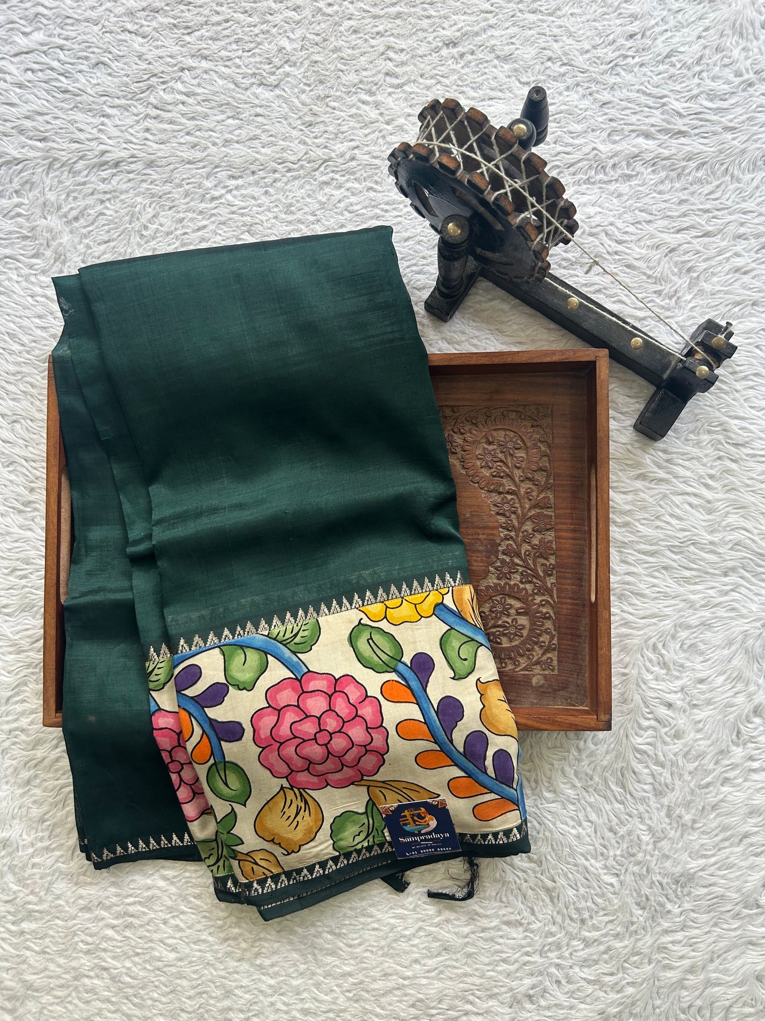 Mangalagiri Pen Kalamkari Saree Dark Green colored complemented with a Zari border. - Sampradaya Designer Studio
