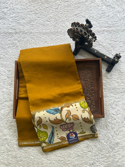 Mangalagiri Pen Kalamkari Saree Mustard Yellow colored complemented with a Zari border. - Sampradaya Designer Studio
