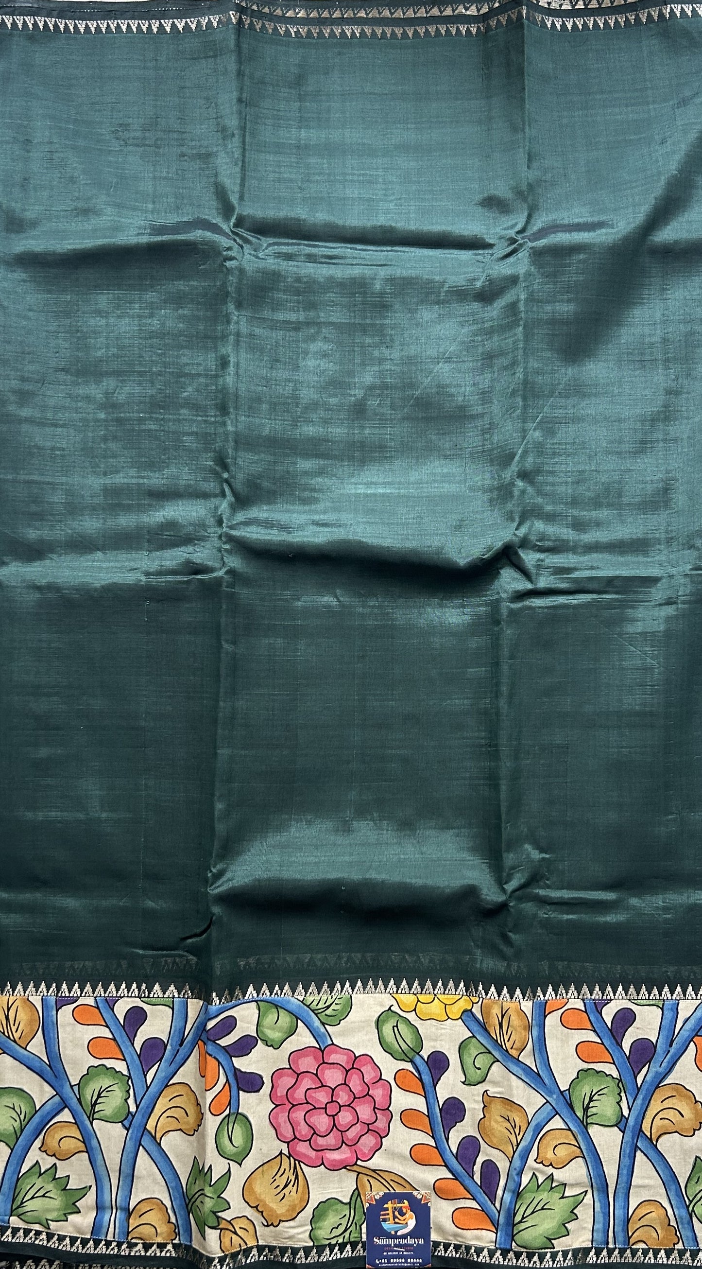 Mangalagiri Pen Kalamkari Saree Dark Green colored complemented with a Zari border. - Sampradaya Designer Studio