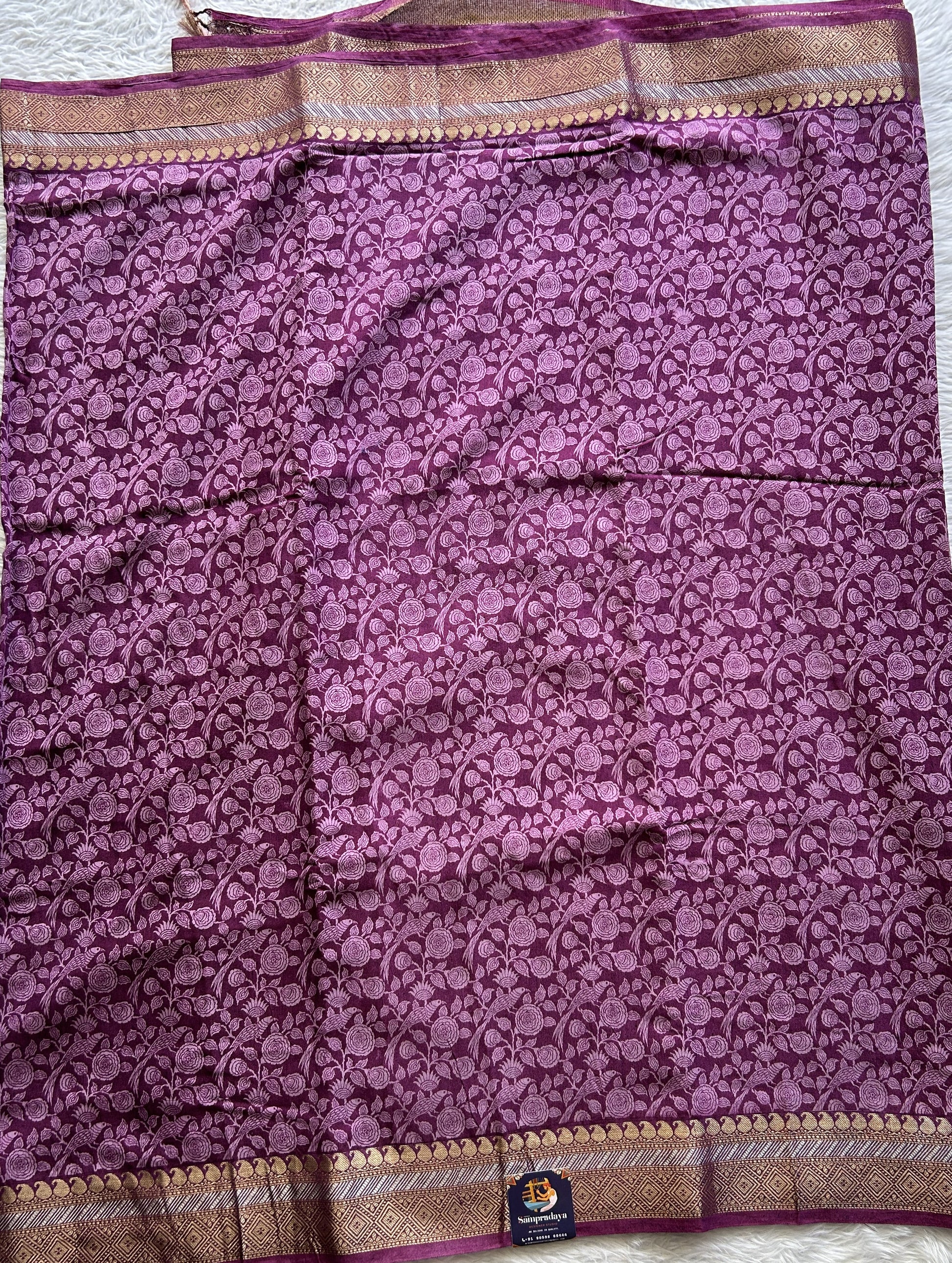 Dola Crepe Saree Dark Lavender Colored Complemented with a Zari Border. - Sampradaya Designer Studio