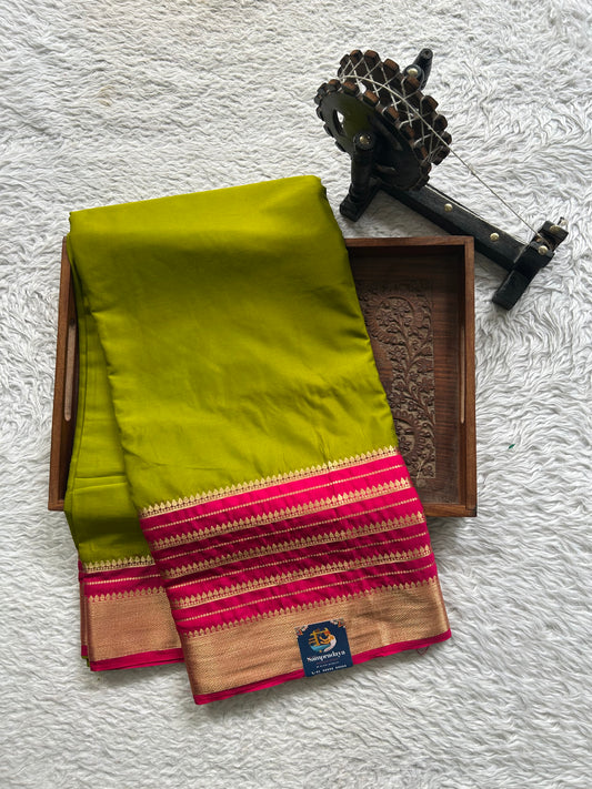 Semi Georgette Saree Light Mehndi Green Colored Elegantly Paired with Zari Border. - Sampradaya Designer Studio