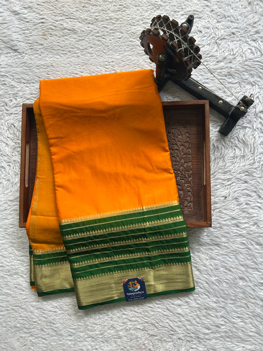 Semi Georgette Saree Turmeric Yellow Colored Elegantly Paired with Zari Border. - Sampradaya Designer Studio