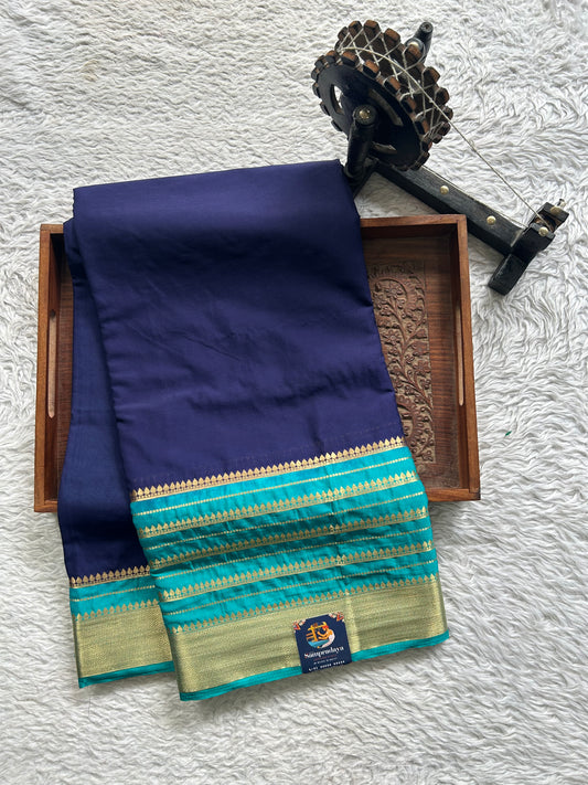 Semi Georgette Saree Violet Colored Elegantly Paired with Zari Border. - Sampradaya Designer Studio