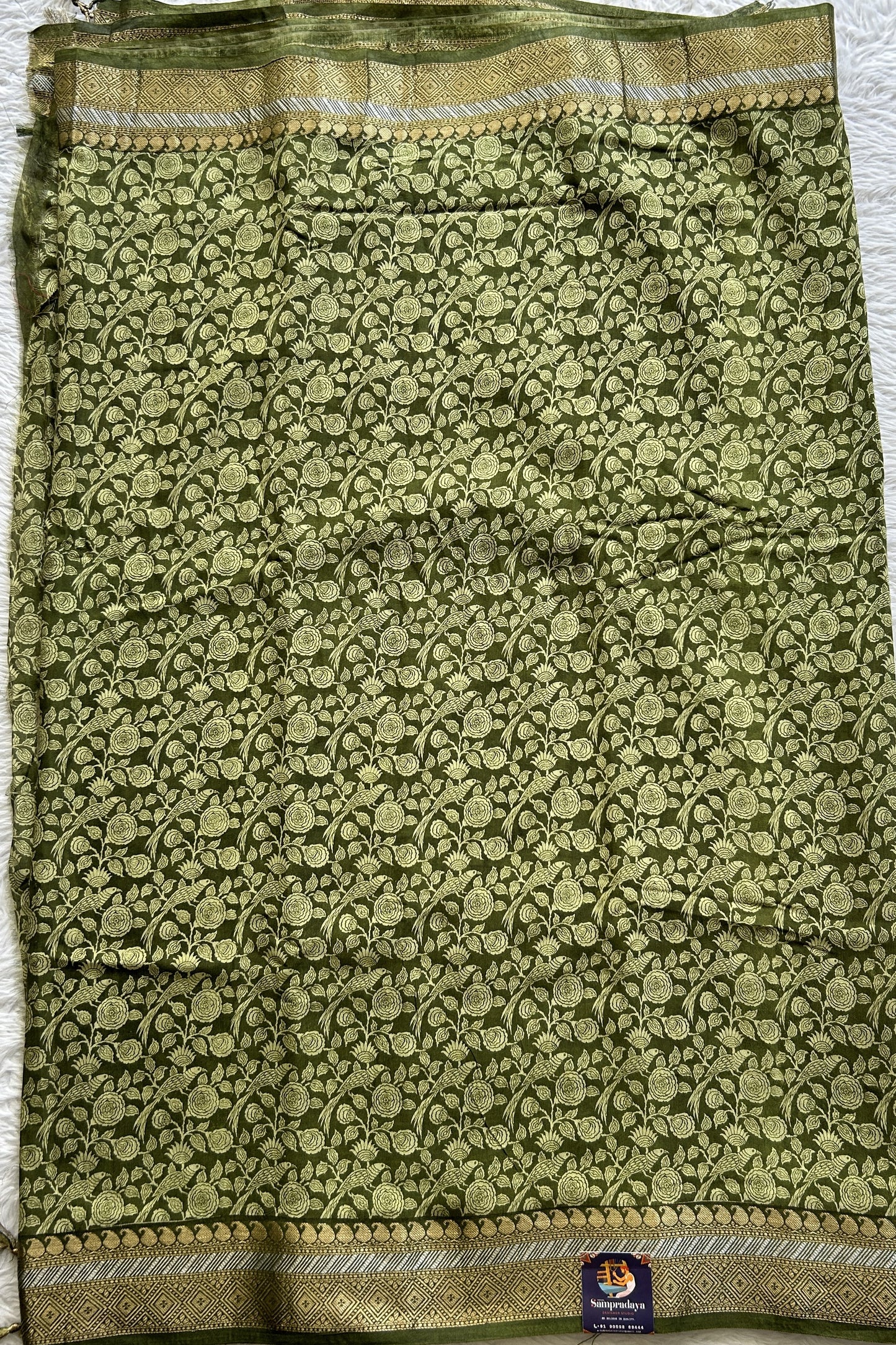 Dola Crepe Saree Green Colored Complemented with a Zari Border. - Sampradaya Designer Studio