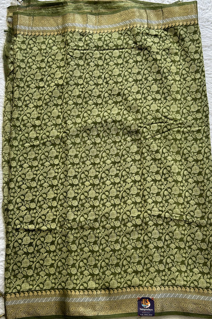 Dola Crepe Saree Green Colored Complemented with a Zari Border. - Sampradaya Designer Studio