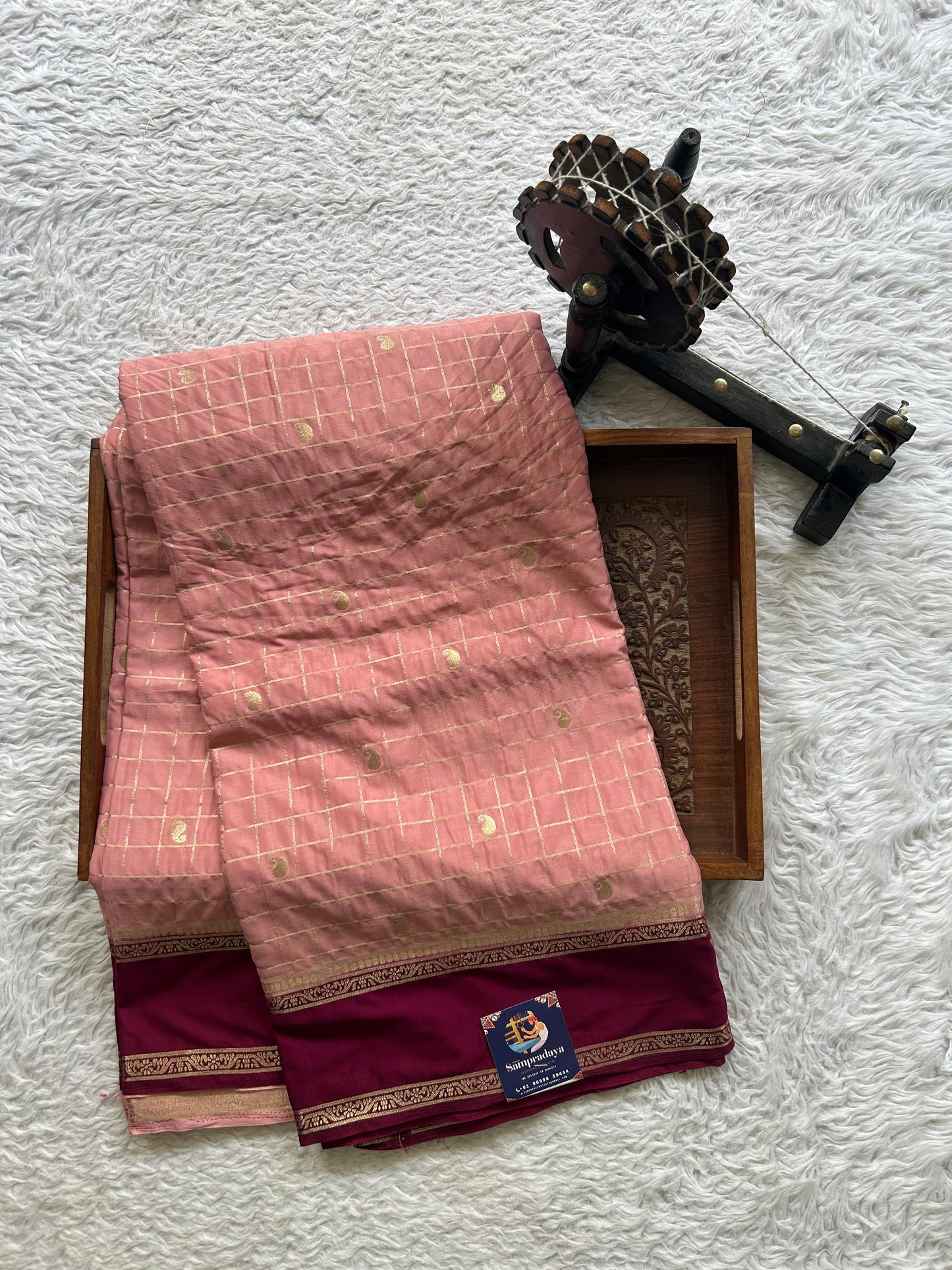 Pure Banarasi Crepe Silk Saree Peach Colored Complemented with a Zari border. - Sampradaya Designer Studio
