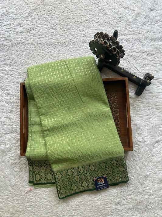 Pure Banarasi Crepe Silk Saree Light Green Colored Complemented with a Zari border. - Sampradaya Designer Studio