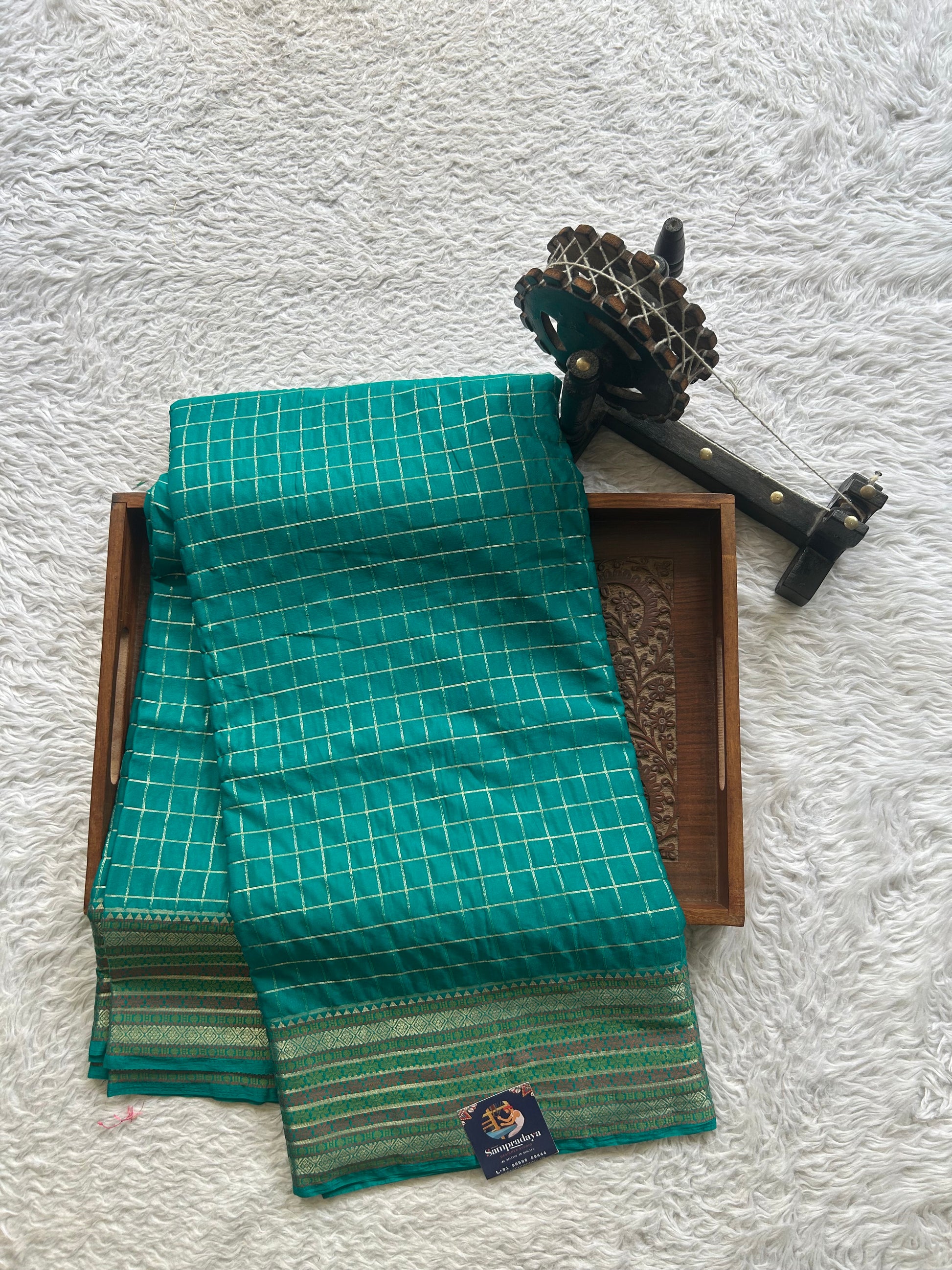 Pure Banarasi Crepe Silk Saree Aqua Blue Colored Complemented with a Zari border. - Sampradaya Designer Studio