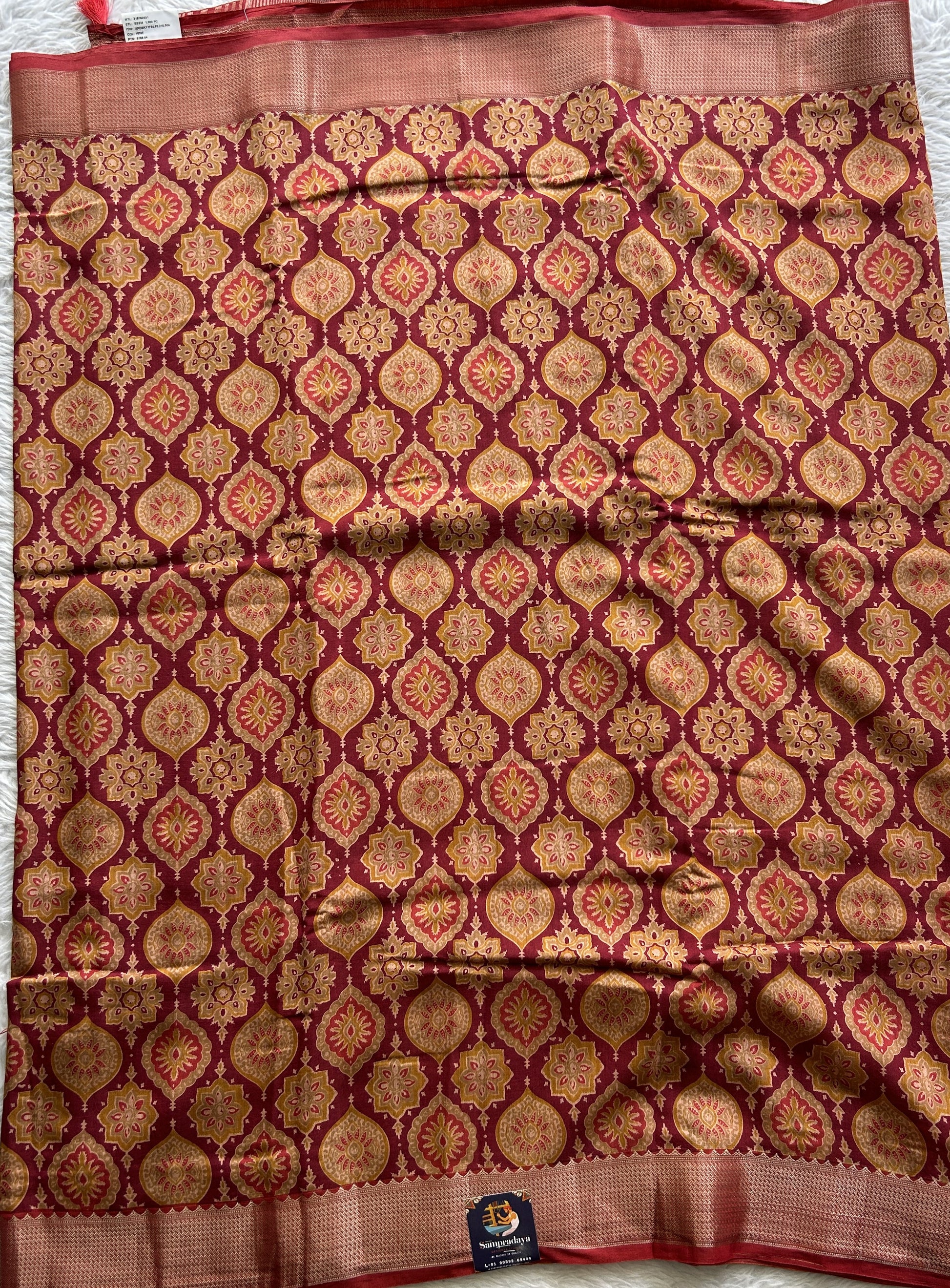 Dola Crepe Saree Dark Maroon Colored Complemented with a Zari Border. - Sampradaya Designer Studio