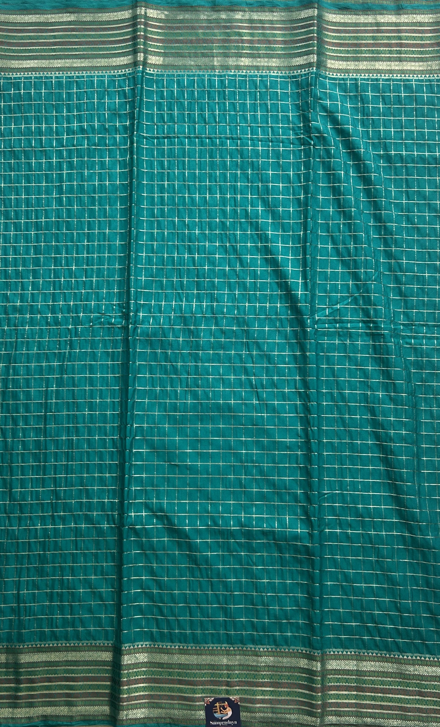 Pure Banarasi Crepe Silk Saree Aqua Blue Colored Complemented with a Zari border. - Sampradaya Designer Studio