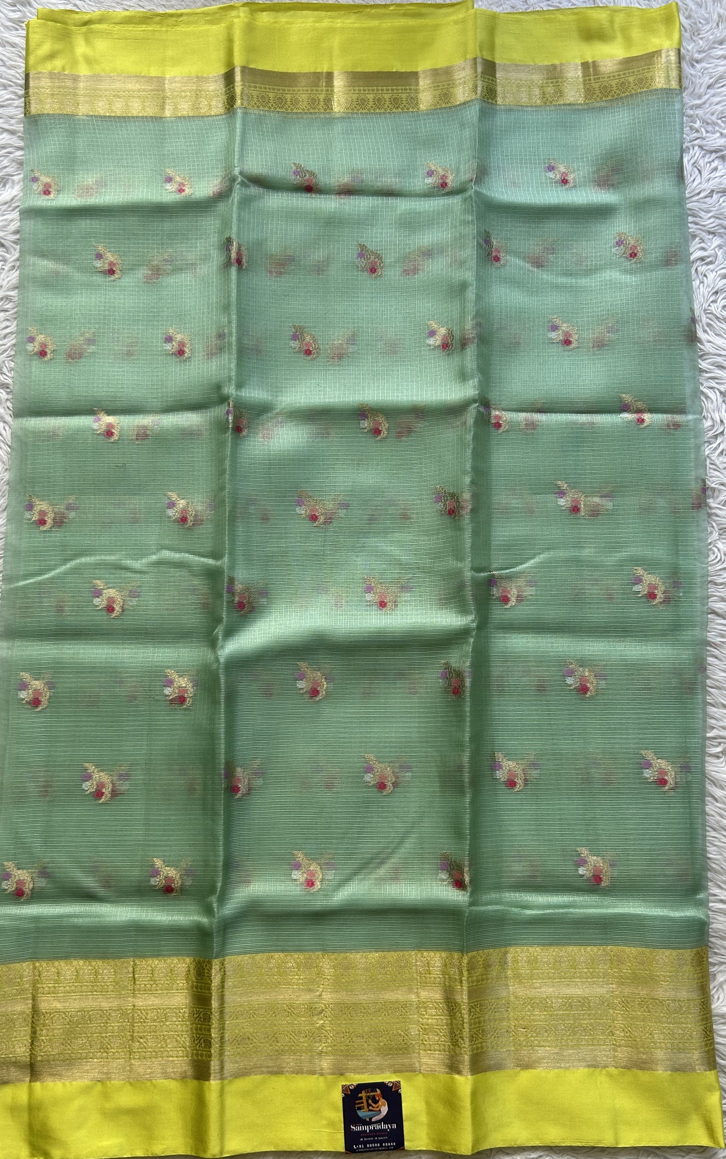 Silk kota Saree Seafoam Green colored Elegantly Paired Yellow Color with a Zari Border. - Sampradaya Designer Studio
