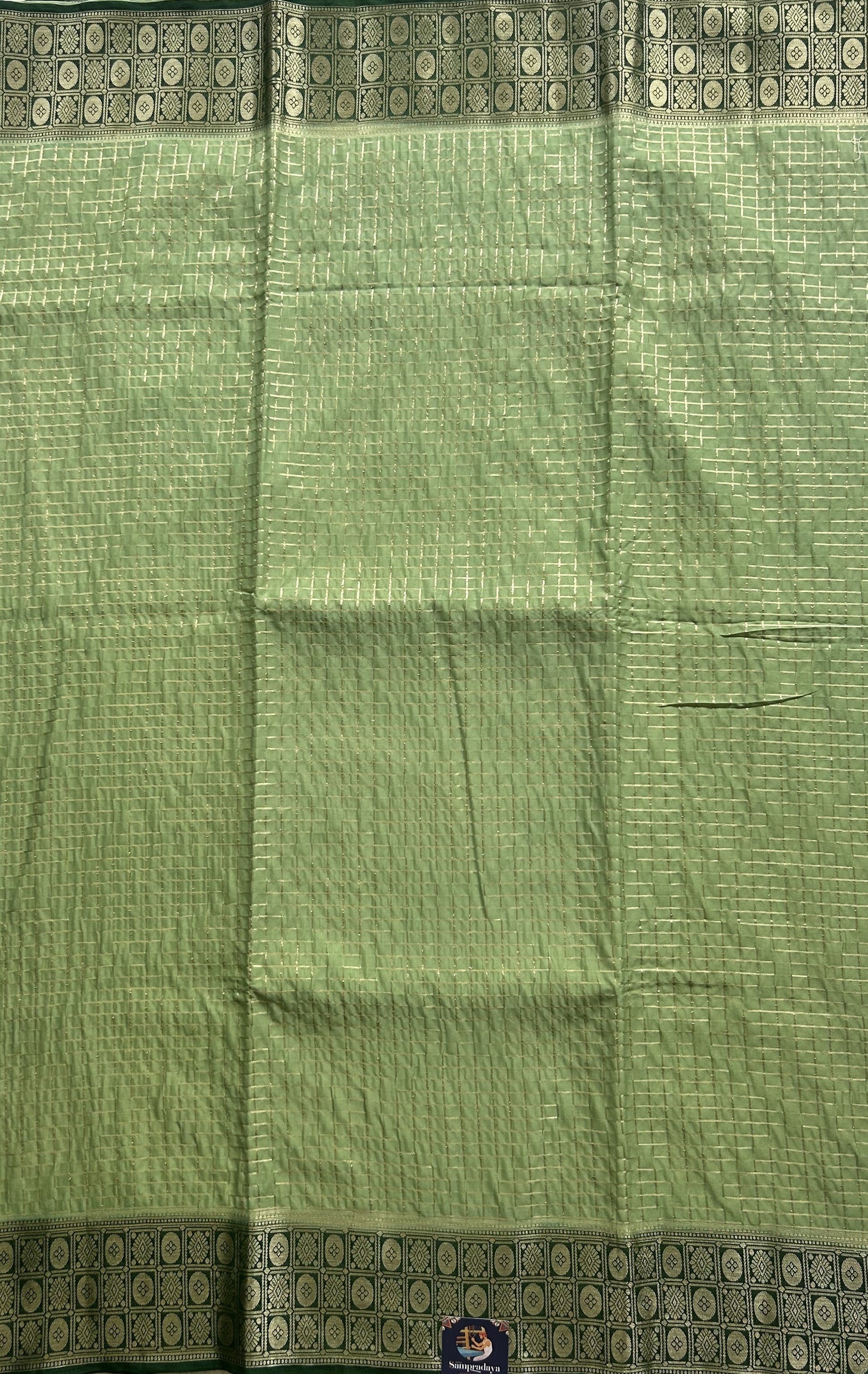 Pure Banarasi Crepe Silk Saree Light Green Colored Complemented with a Zari border. - Sampradaya Designer Studio