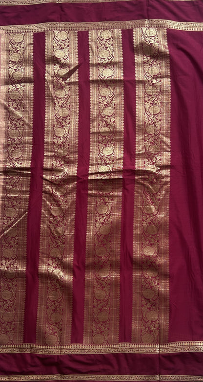 Pure Banarasi Crepe Silk Saree Peach Colored Complemented with a Zari border. - Sampradaya Designer Studio