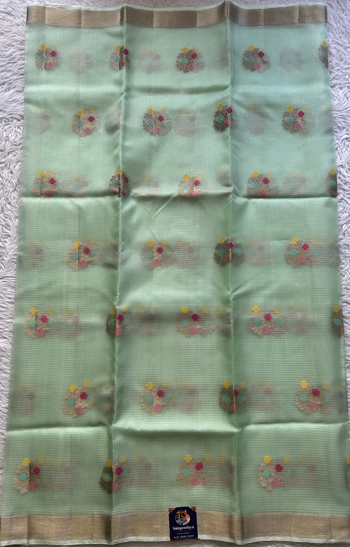 Silk kota Saree Mint Green colored Elegantly Paired with a Zari Border. - Sampradaya Designer Studio