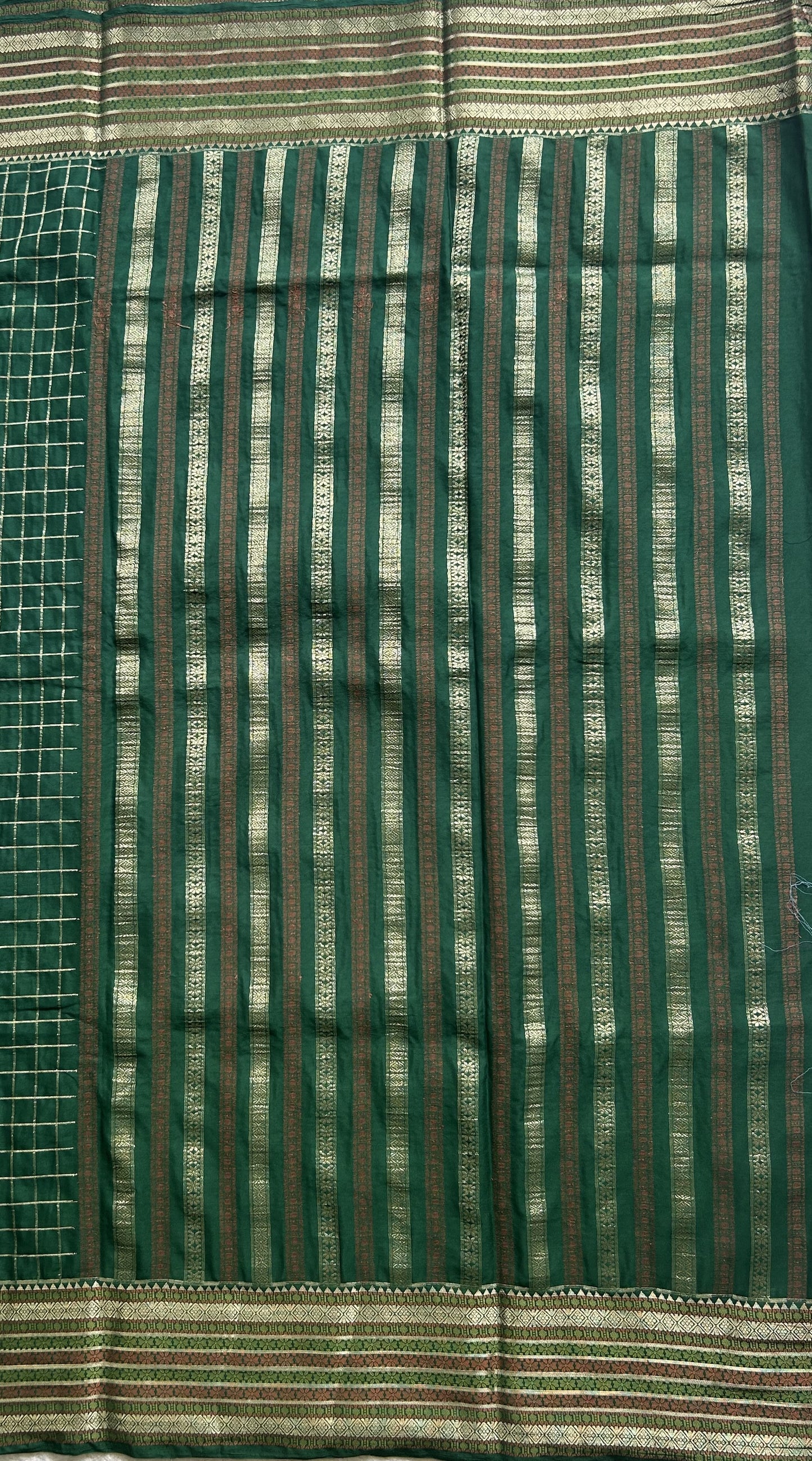 Pure Banarasi Crepe Silk Saree Bottle Green Colored Complemented with a Zari border. - Sampradaya Designer Studio