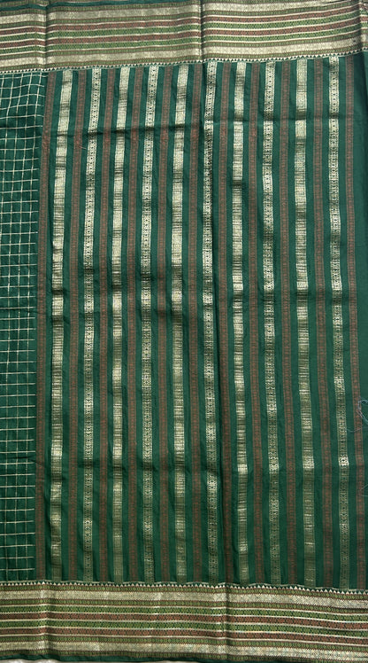 Pure Banarasi Crepe Silk Saree Bottle Green Colored Complemented with a Zari border. - Sampradaya Designer Studio