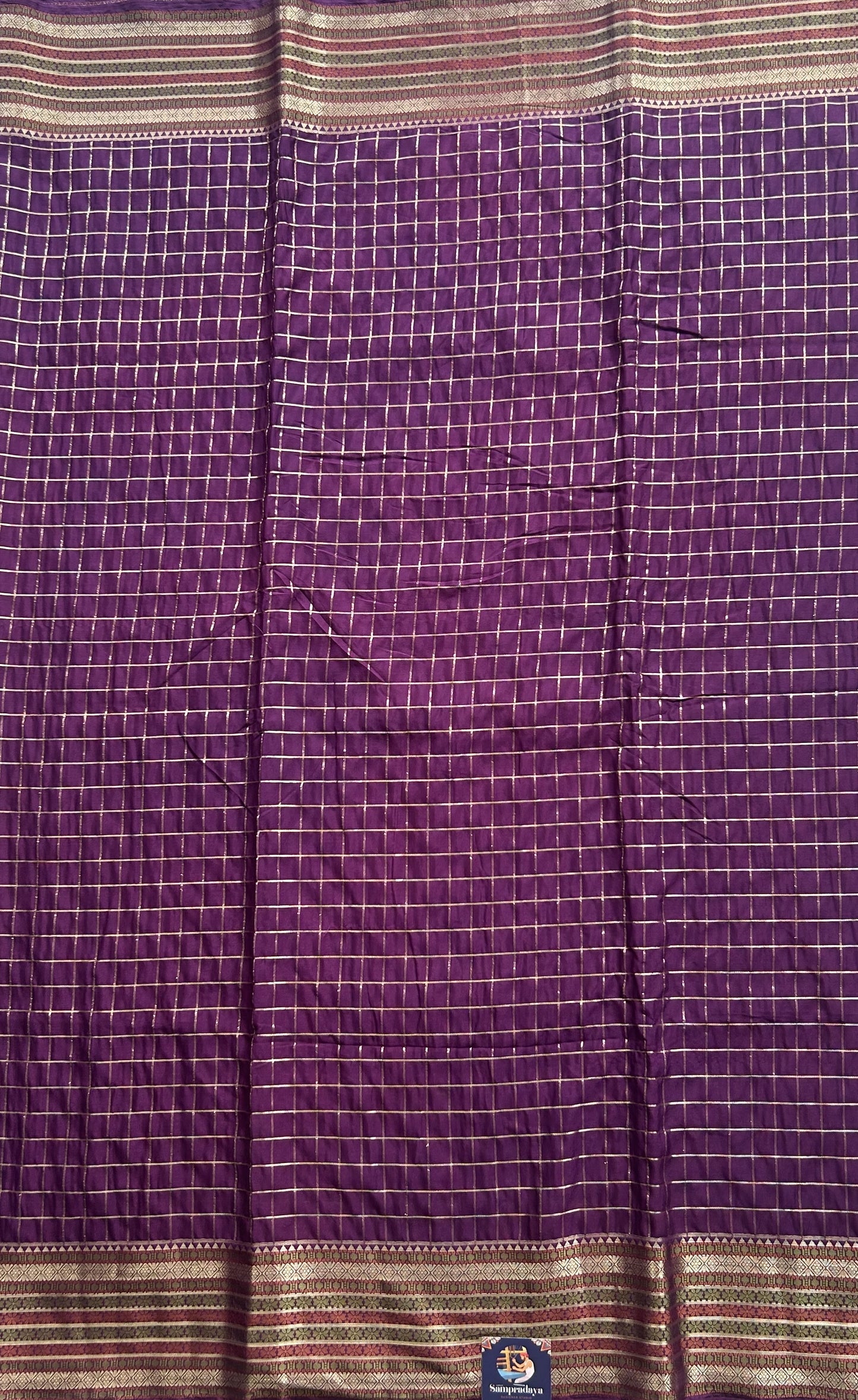 Pure Banarasi Crepe Silk Saree Purple Colored Complemented with a Zari border. - Sampradaya Designer Studio