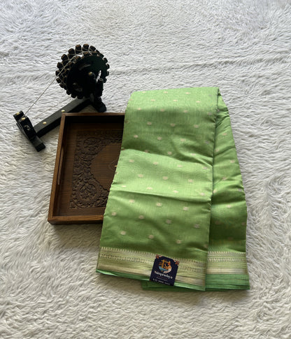 Maheshwari Chanderi Cotton Saree Light Green Colored Elegantly Paired with a Zari Border. - Sampradaya Designer Studio