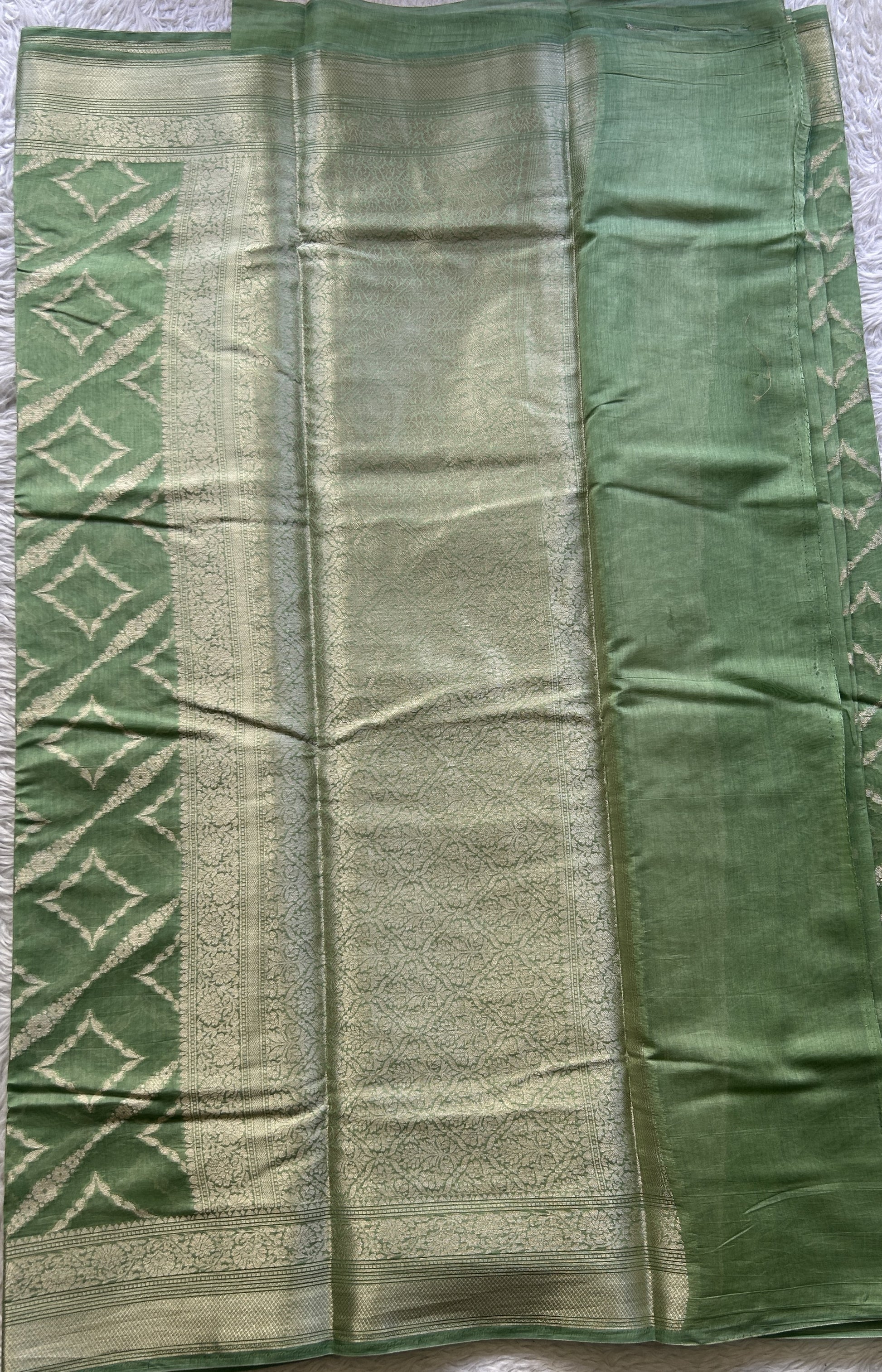 Maheshwari Chanderi Cotton Saree Green Colored Elegantly Paired with a Zari Border. - Sampradaya Designer Studio