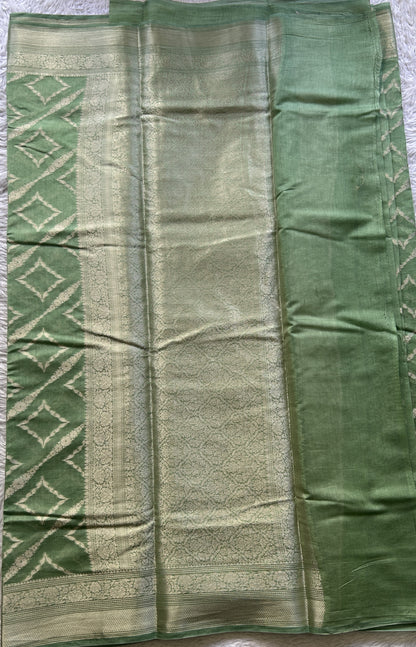Maheshwari Chanderi Cotton Saree Green Colored Elegantly Paired with a Zari Border. - Sampradaya Designer Studio