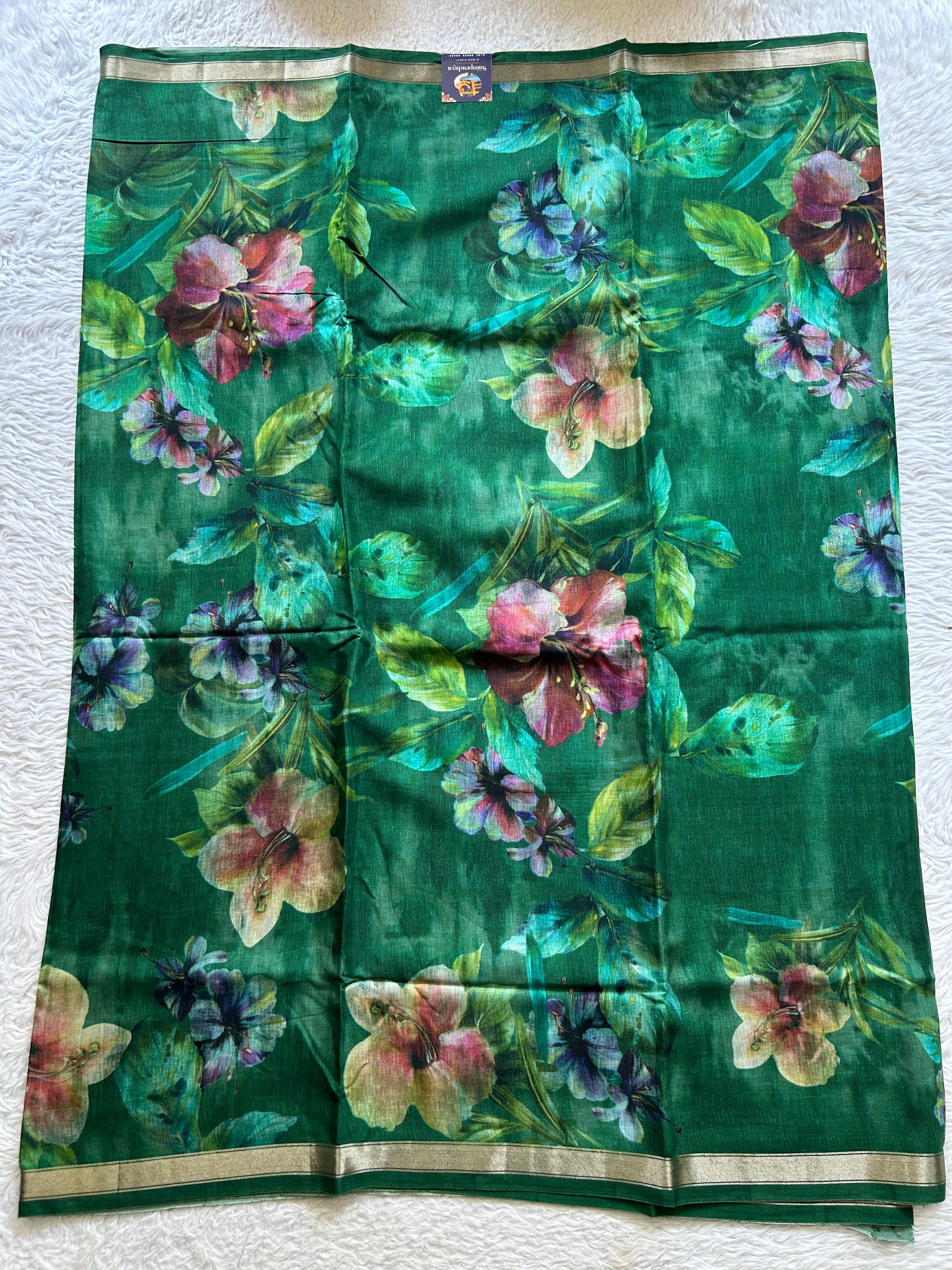 Banarasi Crepe Silk Saree Green Colored Elegantly Paired with a Gold Zari Border. - Sampradaya Designer Studio