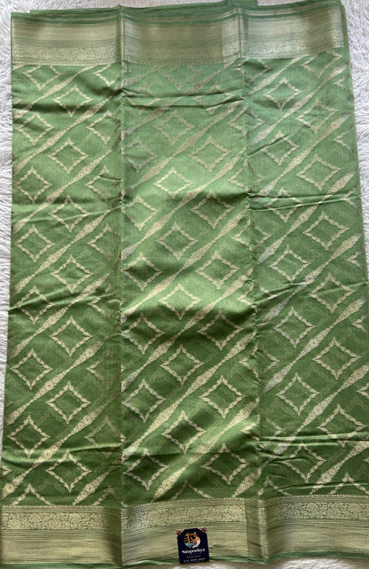 Maheshwari Chanderi Cotton Saree Green Colored Elegantly Paired with a Zari Border. - Sampradaya Designer Studio