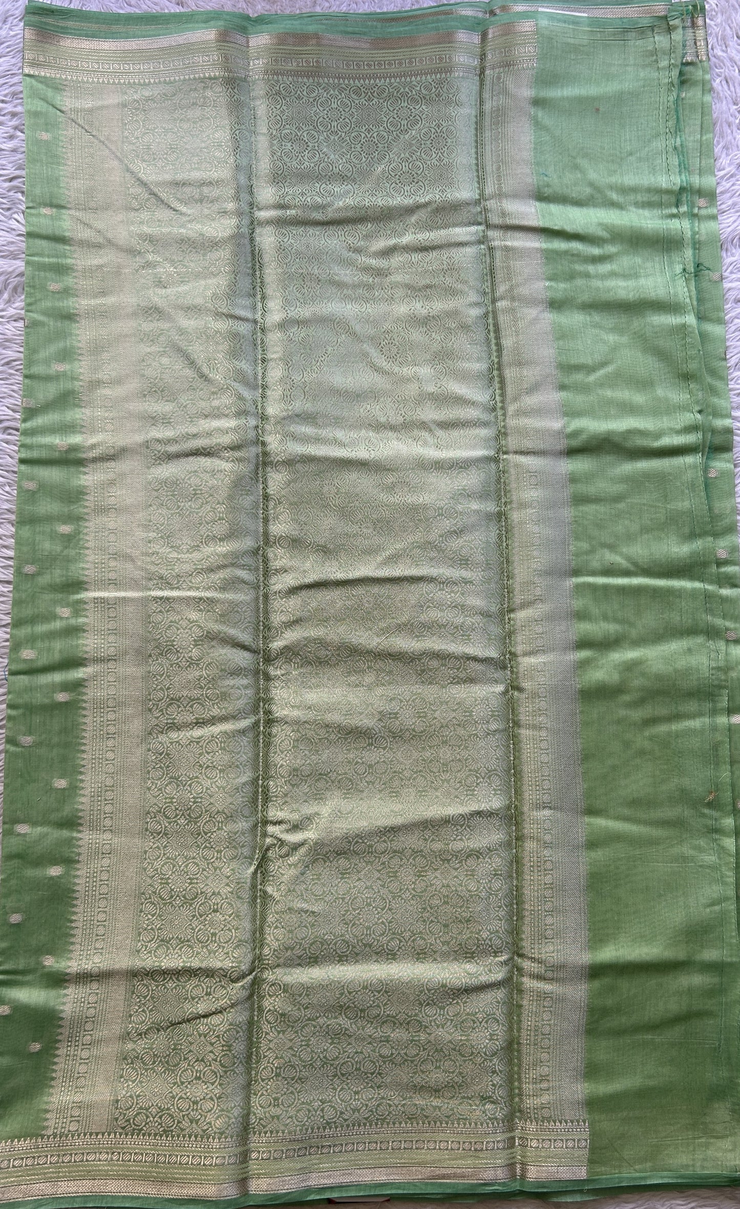 Maheshwari Chanderi Cotton Saree Light Green Colored Elegantly Paired with a Zari Border. - Sampradaya Designer Studio