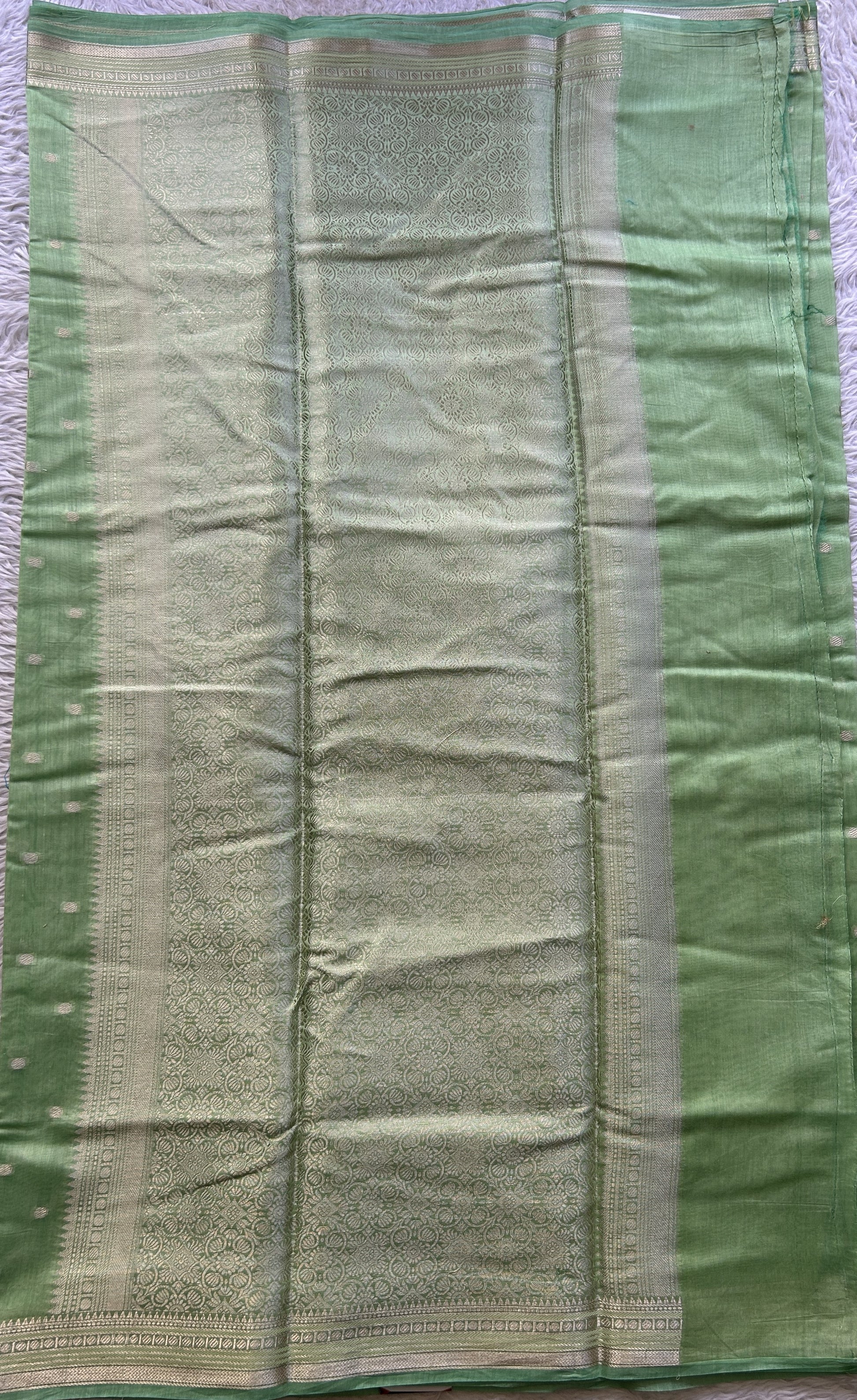 Maheshwari Chanderi Cotton Saree Light Green Colored Elegantly Paired with a Zari Border. - Sampradaya Designer Studio