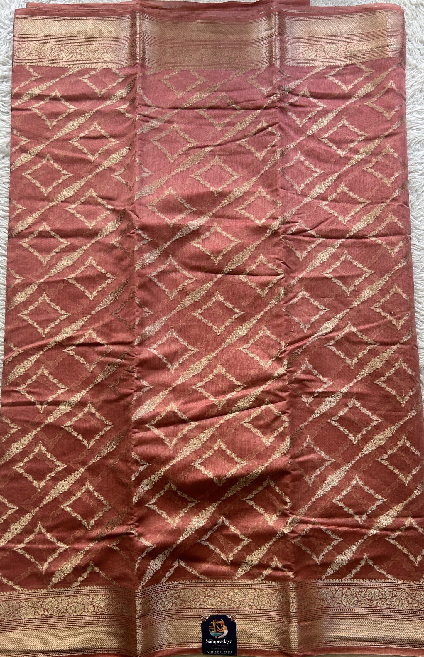 Maheshwari Chanderi Cotton Saree Dark Peach Colored Elegantly Paired with a Zari Border. - Sampradaya Designer Studio