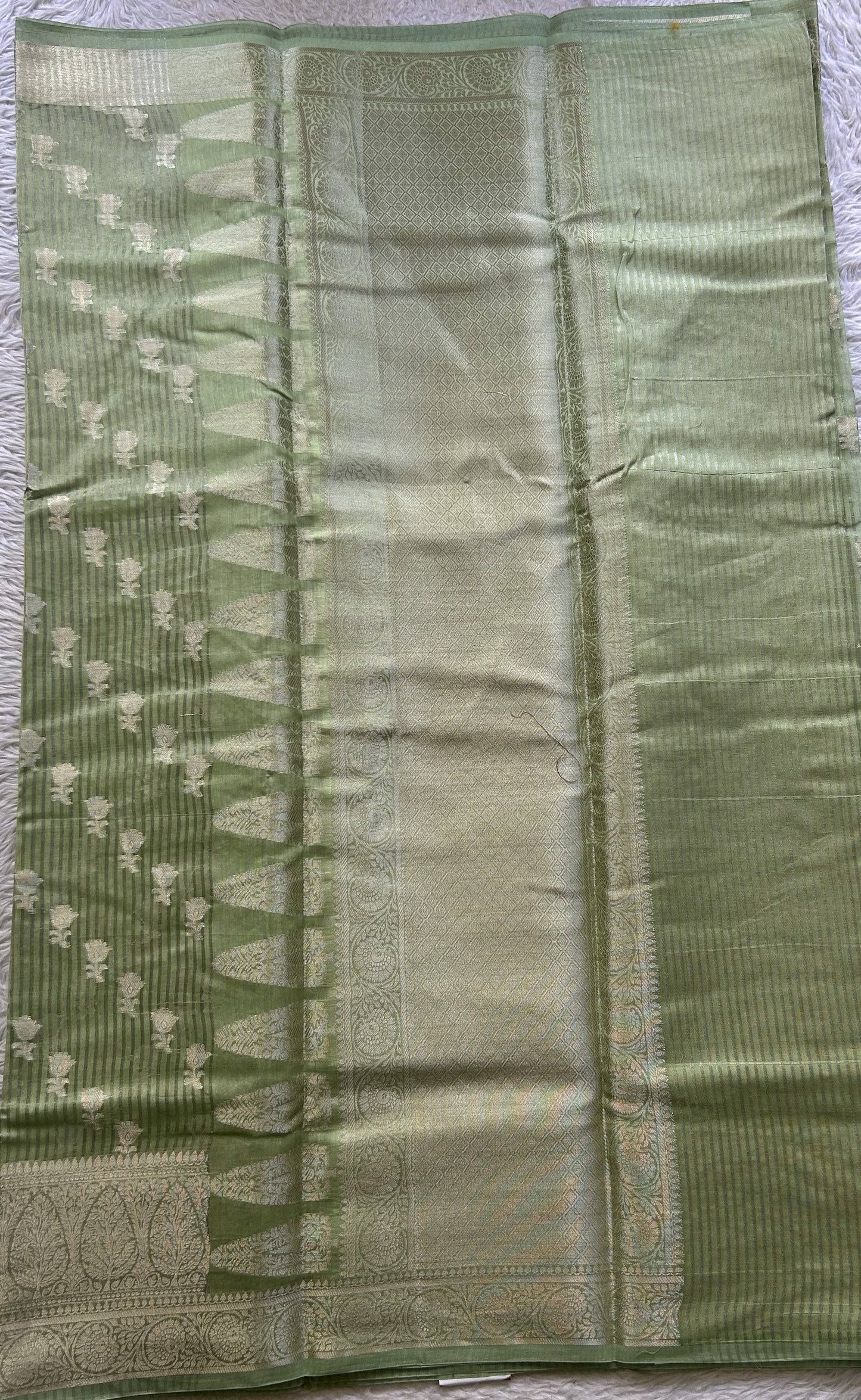 Maheshwari Chanderi Cotton Saree Light Green Colored Elegantly Paired with a Zari Border. - Sampradaya Designer Studio