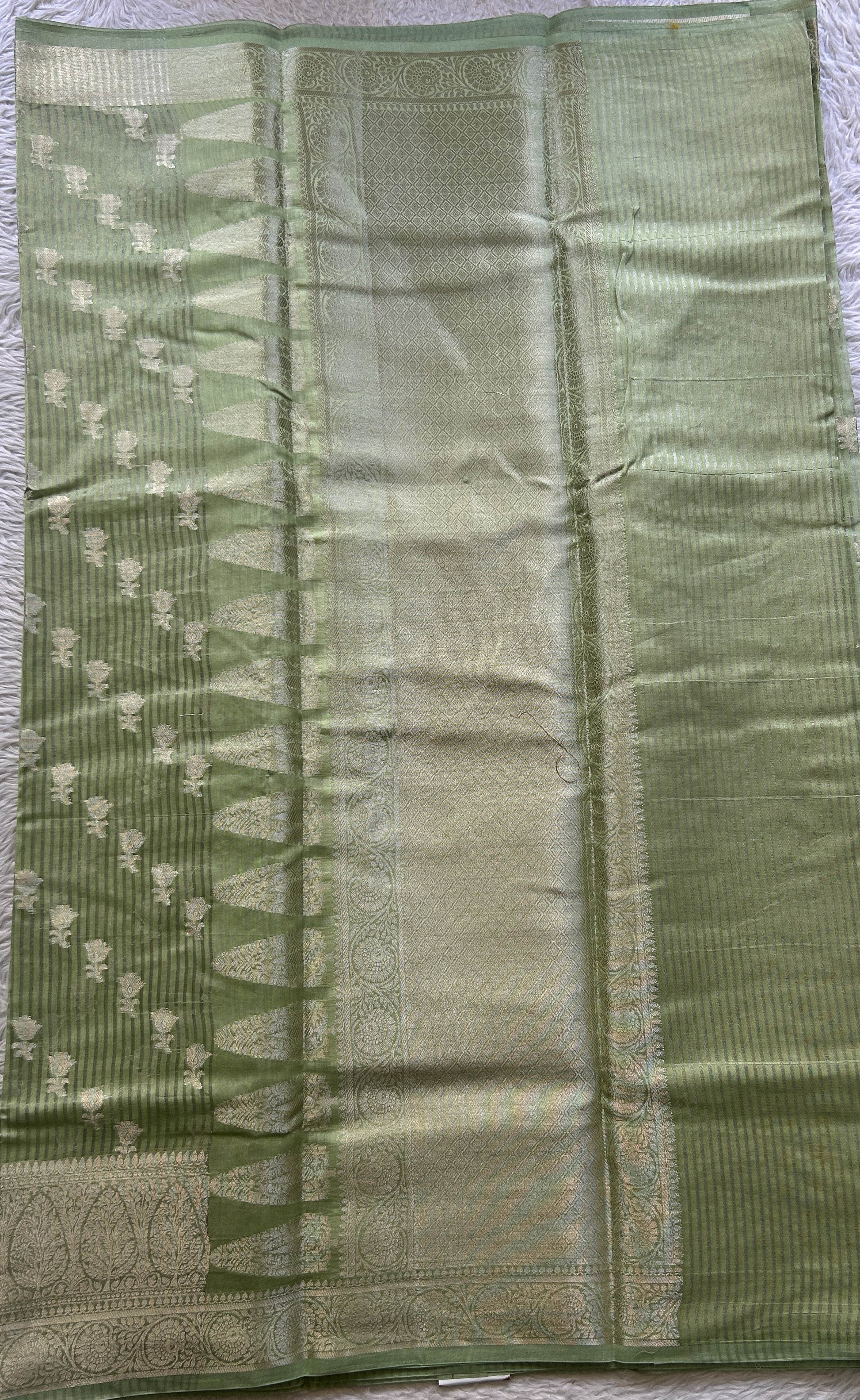 Maheshwari Chanderi Cotton Saree Light Green Colored Elegantly Paired with a Zari Border. - Sampradaya Designer Studio