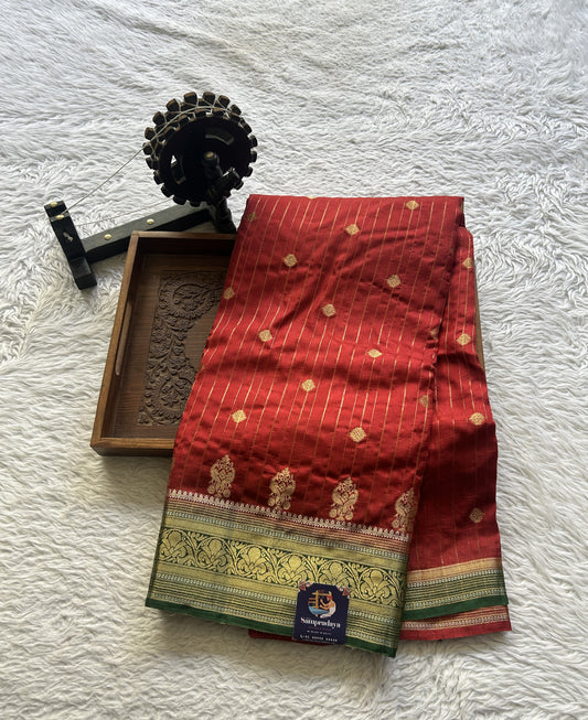 Viscose Georgette Saree Red Colored Complemented with a Green Color Zari Border. - Sampradaya Designer Studio