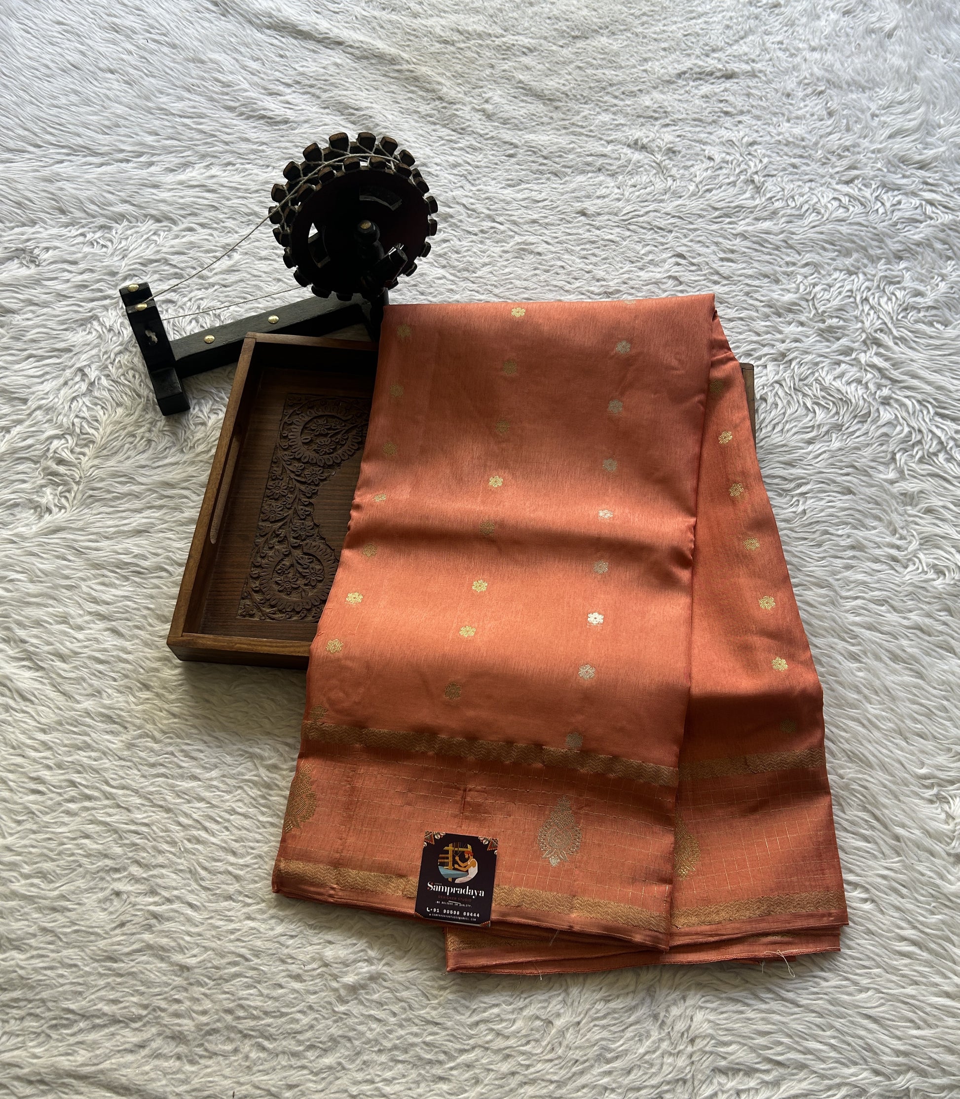 Satin Georgette Saree Pale Orange Colored Elegantly Paired with a Zari Border. - Sampradaya Designer Studio
