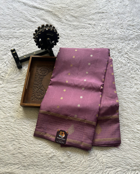 Satin Georgette Saree Lavender Colored Elegantly Paired with a Zari Border. - Sampradaya Designer Studio